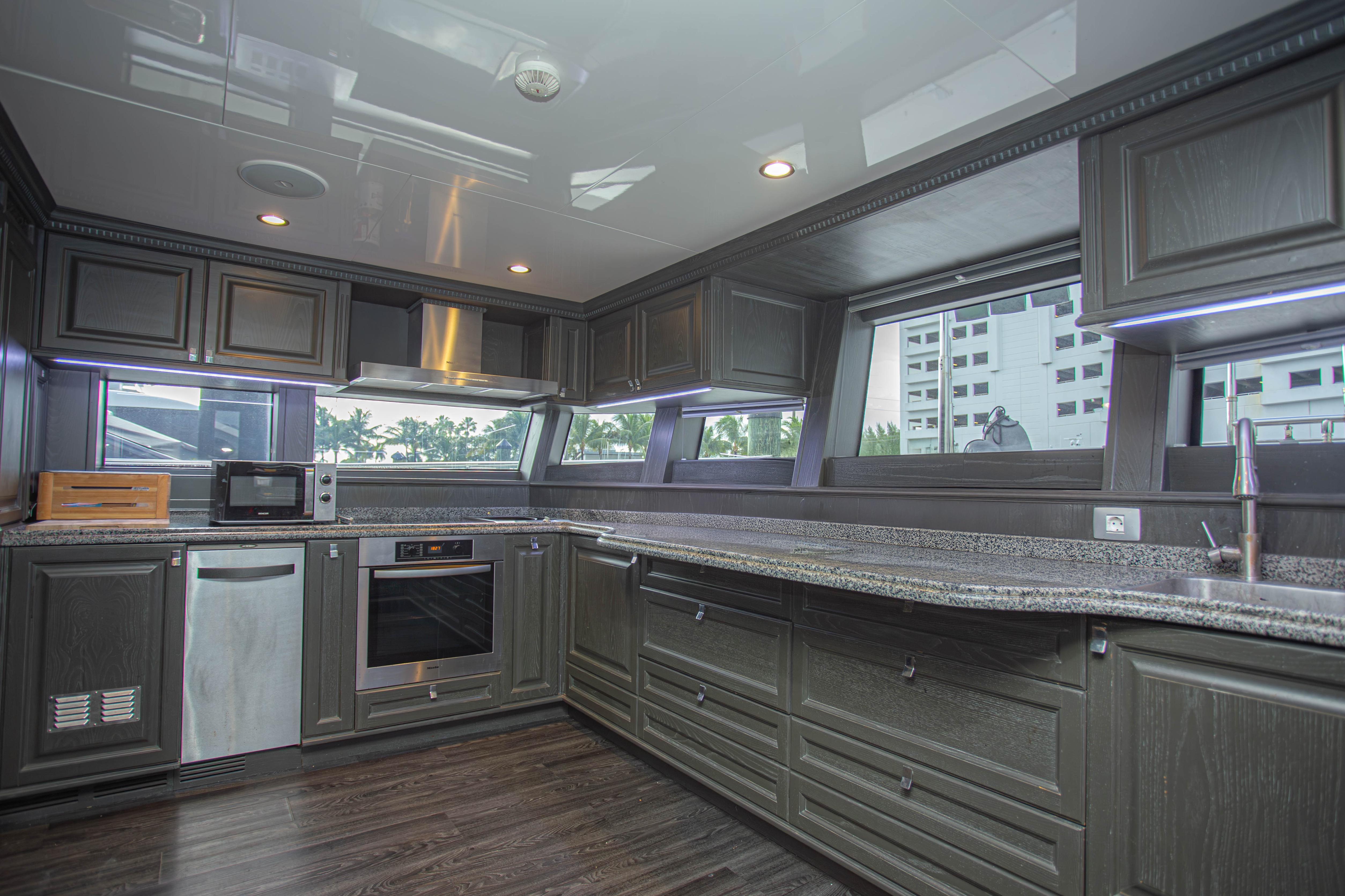 Luxurious kitchen interior on 2014 Fifth Ocean Yachts 24m Explorer Yacht.
