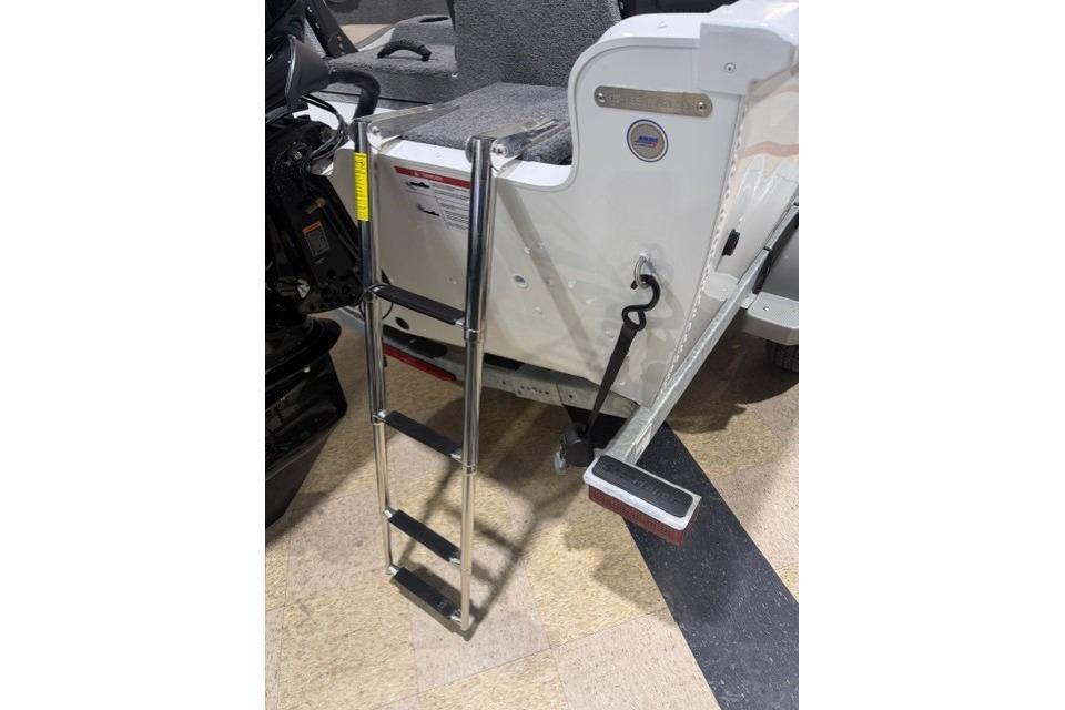 2026 Lund 1650 Rebel XL SS boat with attached boarding ladder.