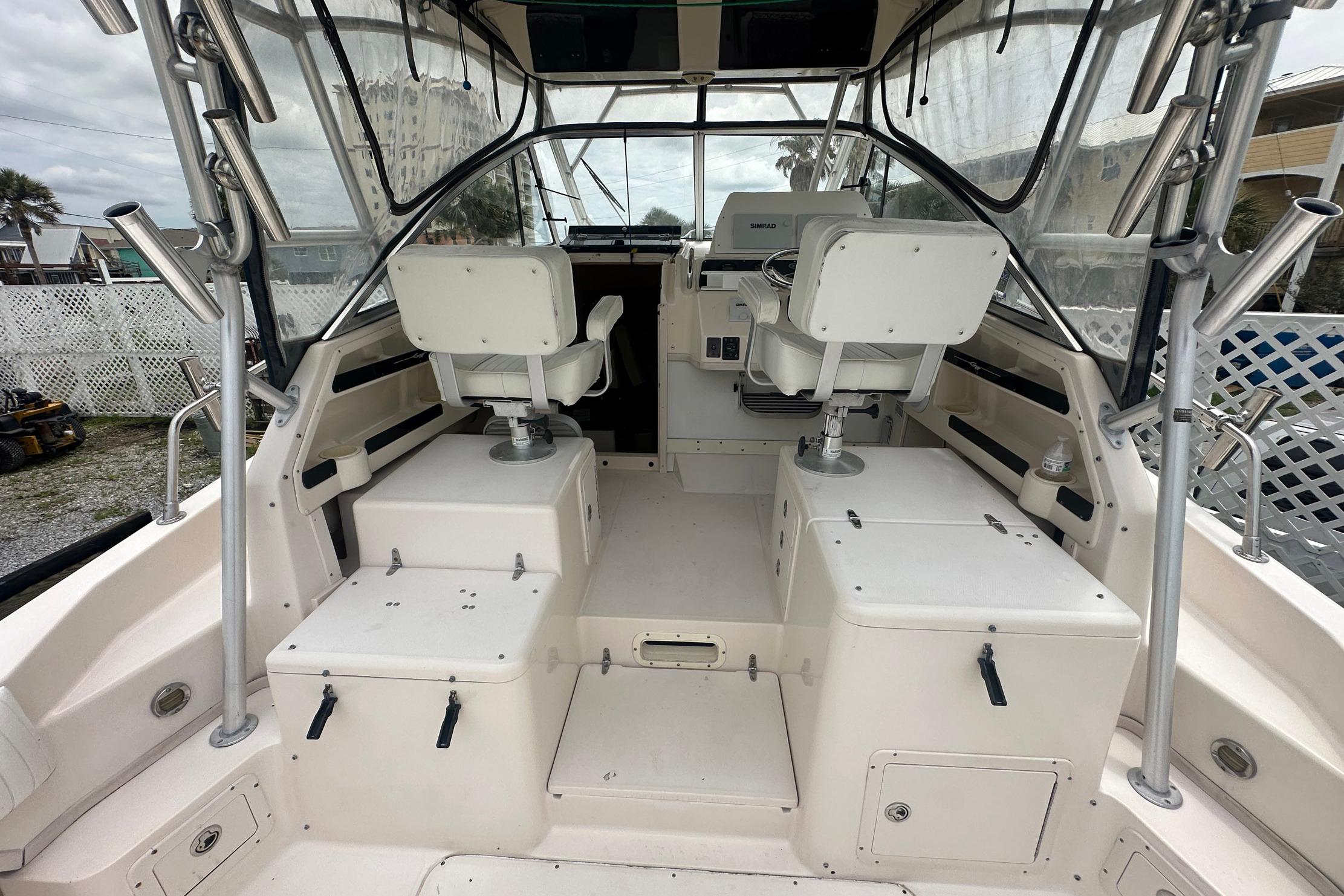 2006 Grady-White Marlin 300 boat interior with helm and seating area.