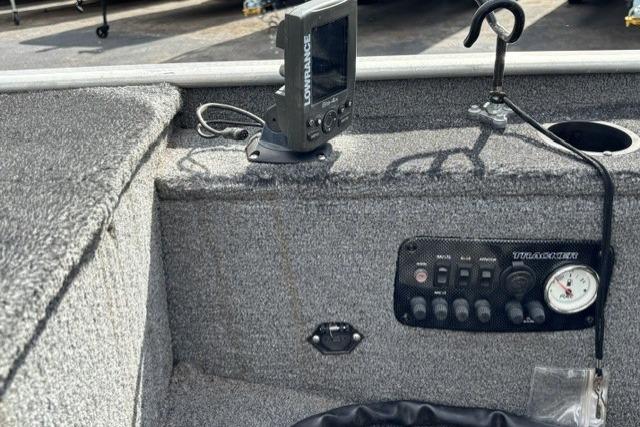 2015 Tracker Panfish 16 boat dashboard with fish finder and control panel.