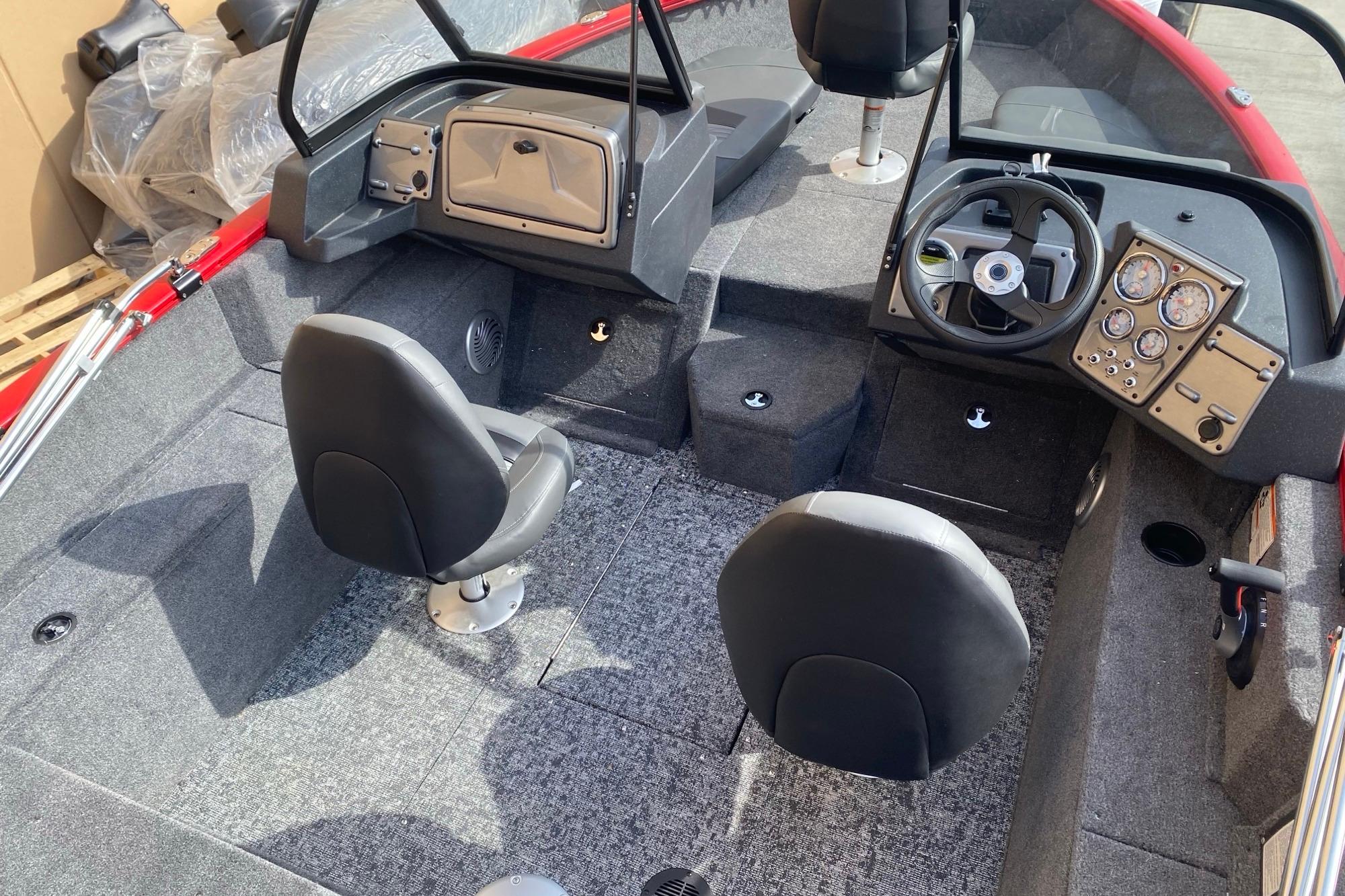 2026 Tracker Pro Guide V-175 Combo boat interior with steering console and seating.