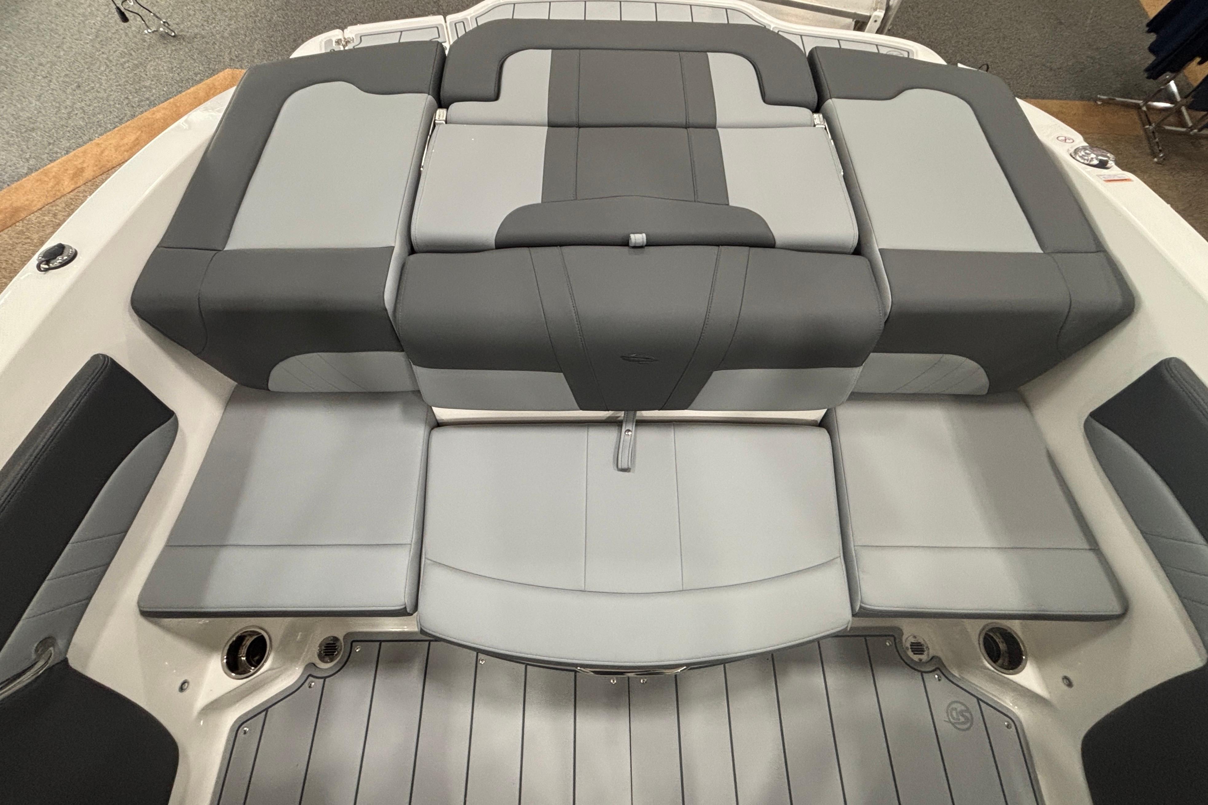 Rear view of 2026 Chaparral 21 SSi with gray upholstery.