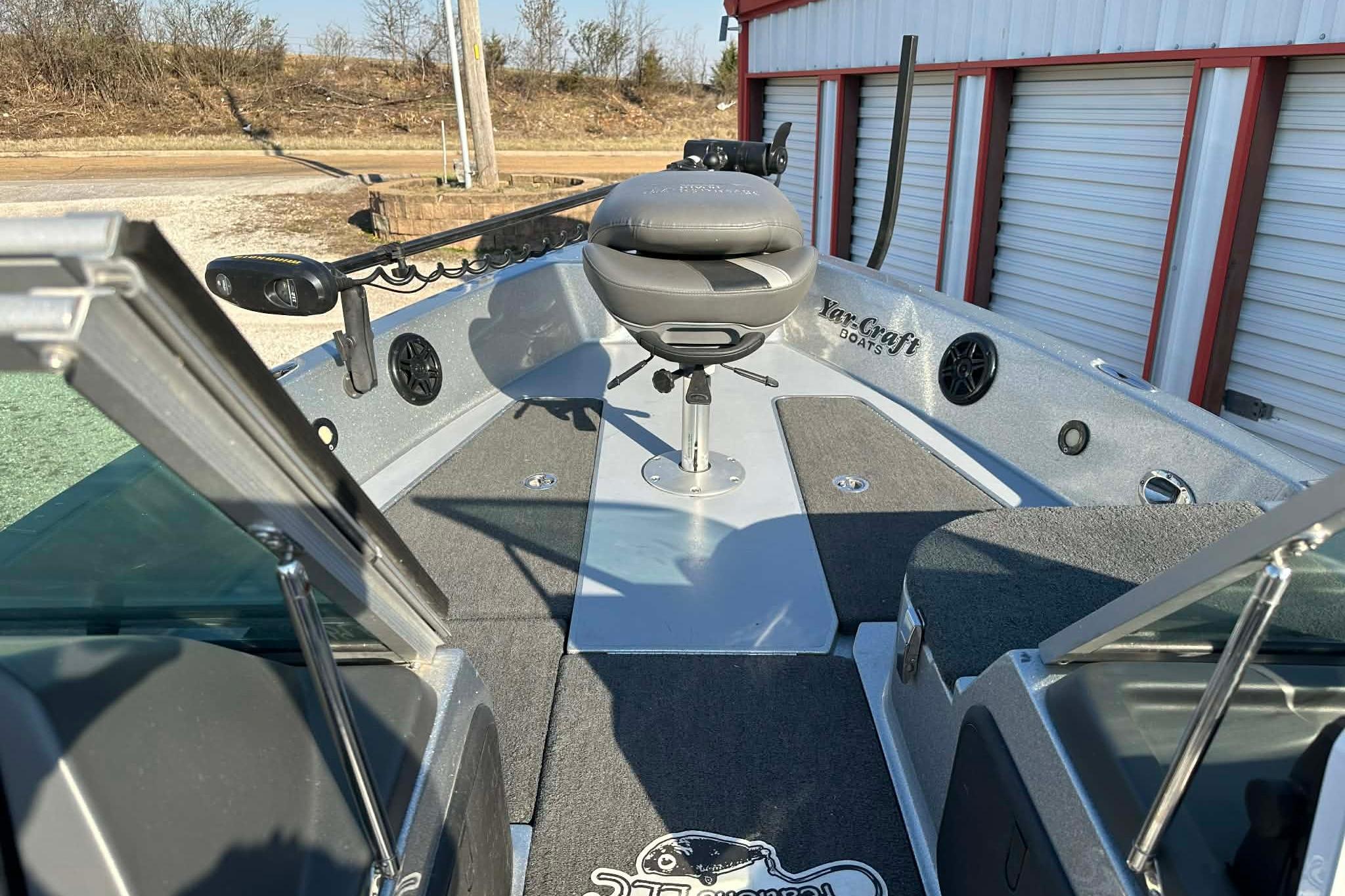 2018 Yar-Craft 219TFX boat interior with seating and fishing equipment.
