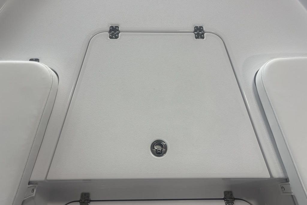 2026 Sportsman Masters 227 boat storage compartment with secure latch and sleek design.