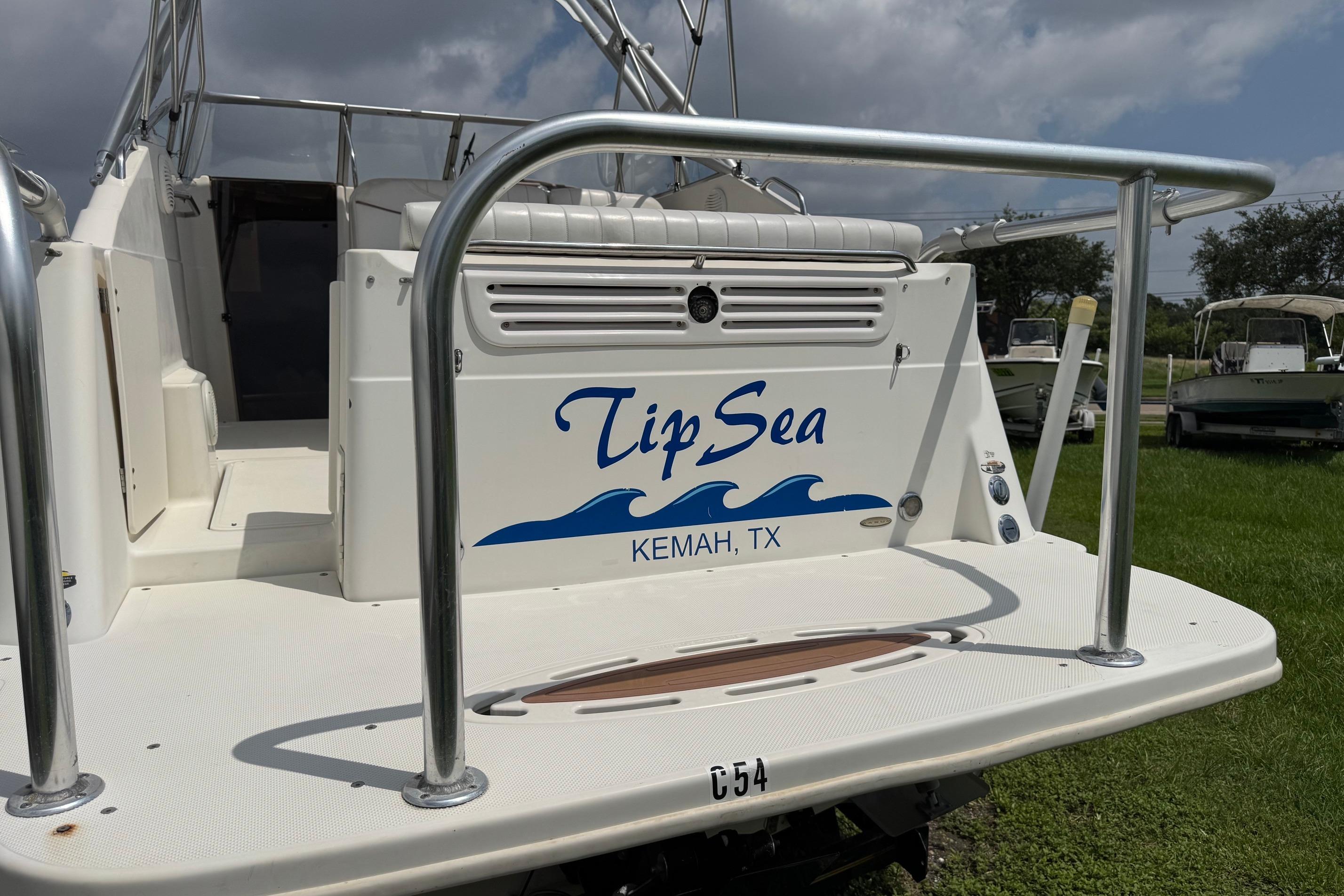 2000 Maxum 2400 SCR boat named "Tip Sea" docked in Kemah, TX.