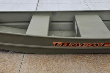 2026 Tracker Grizzly 10 Jon boat on concrete surface.