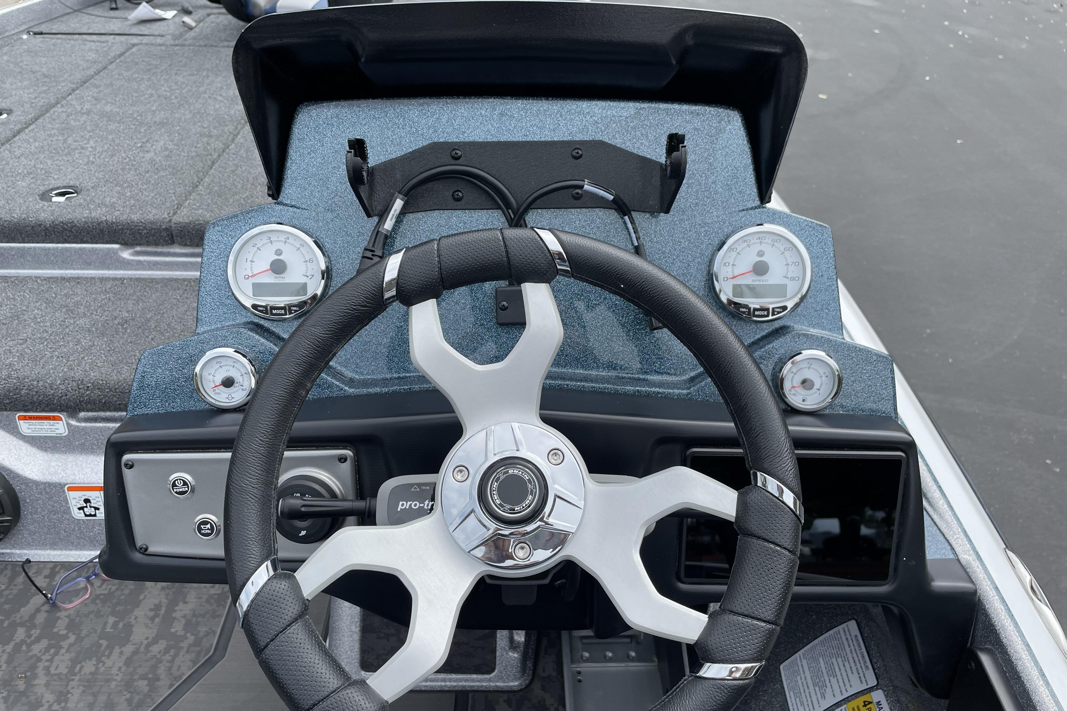 Steering console of 2026 Nitro Z21 XL boat with gauges and controls.