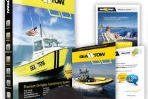 Sea Tow promotional materials featuring a boat, highlighting marine assistance services.