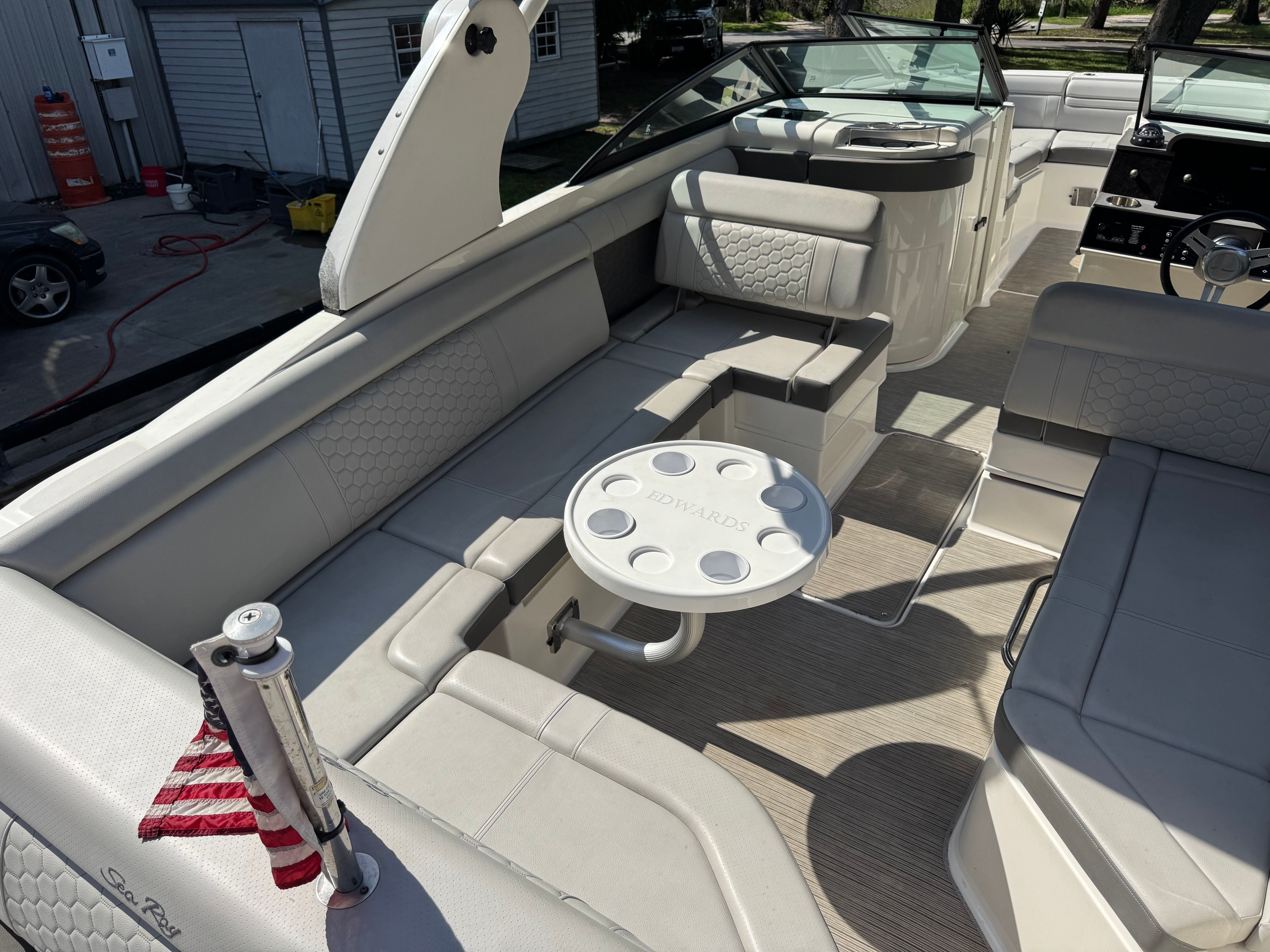 Interior of a 2020 Sea Ray SDX 270 Outboard boat with seating area.