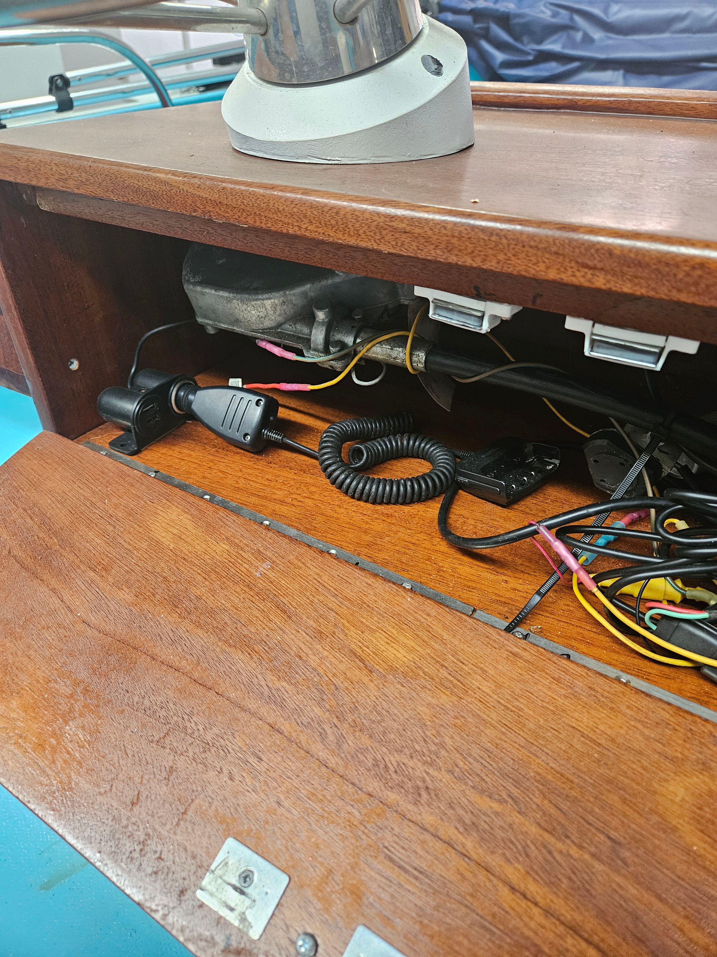 Interior view of a 1977 Boston Whaler 14 with wiring.