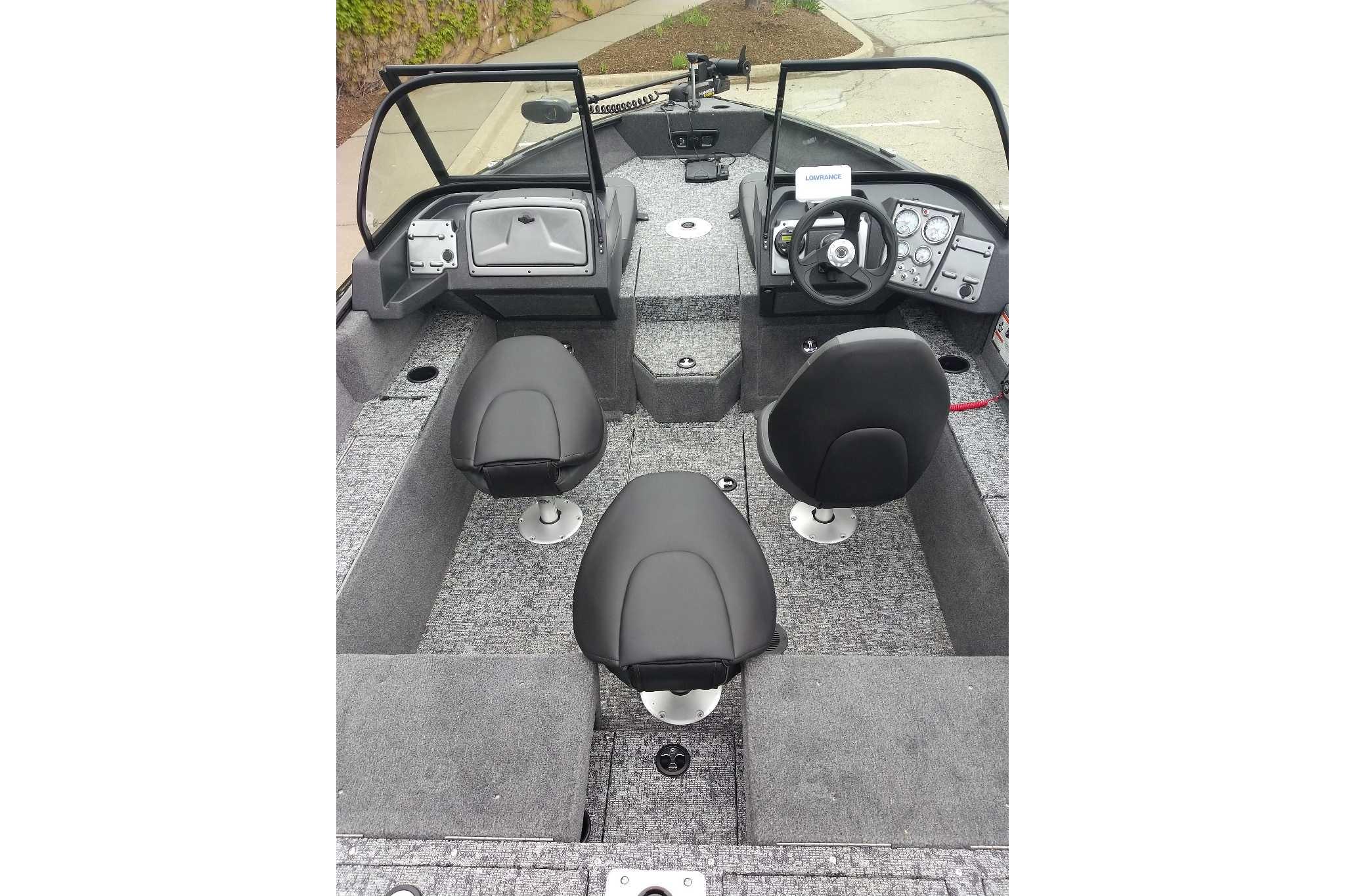 2026 Tracker Pro Guide V-175 Combo boat interior with dual seats and steering console.