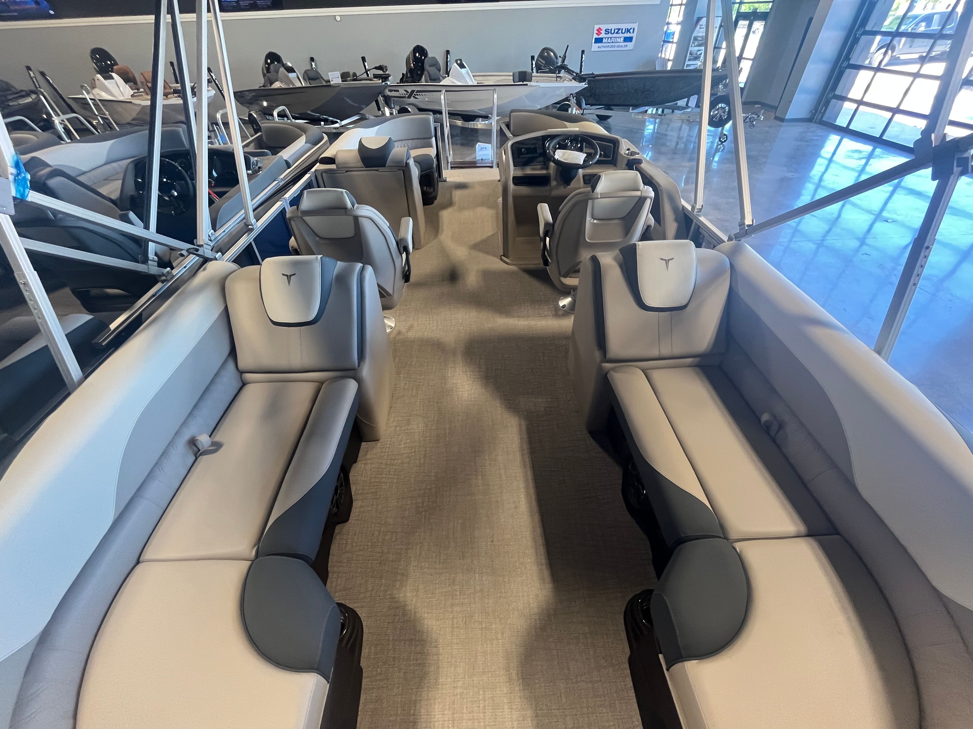 Interior of 2025 Tahoe LTZ QL boat with luxurious seating.