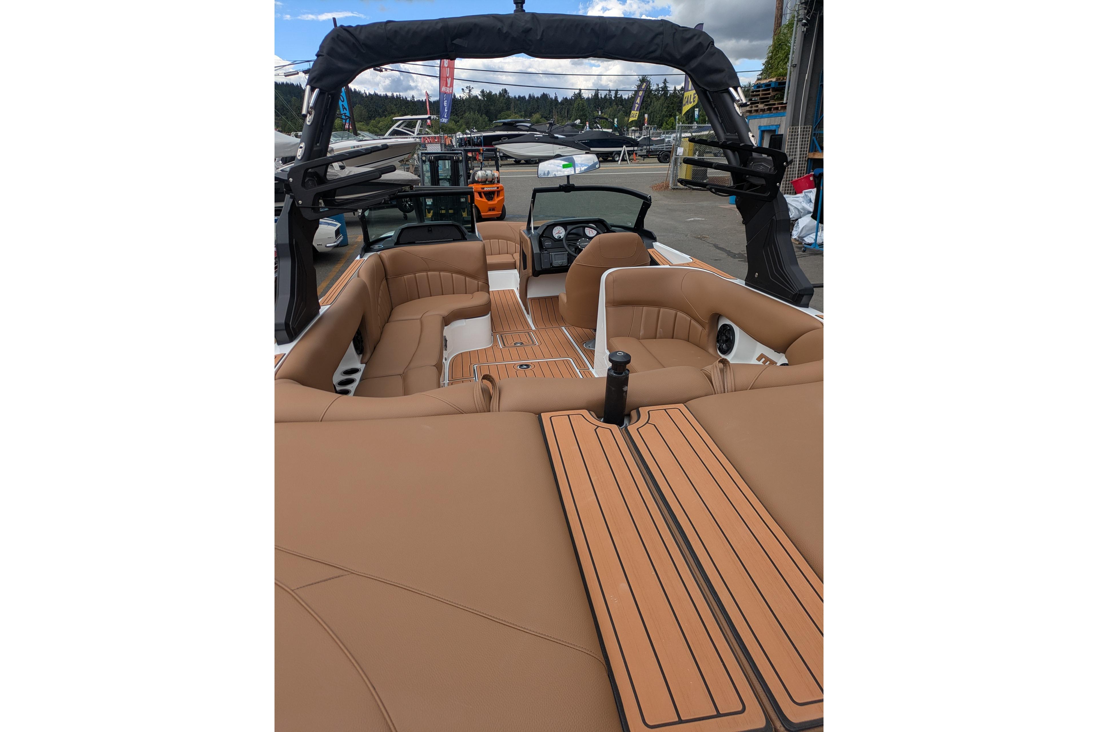 2026 MB B52-23 Classic LIMITED boat interior with tan seating and sleek design.