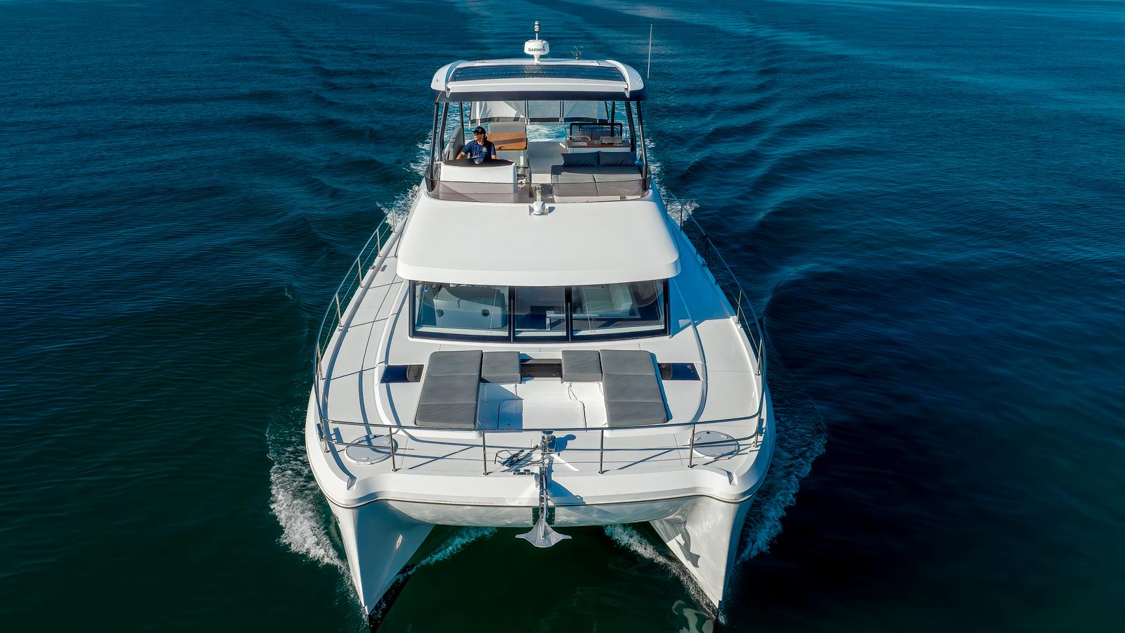 Fountaine Pajot MY 6 yacht 2023 cruising on calm waters.
