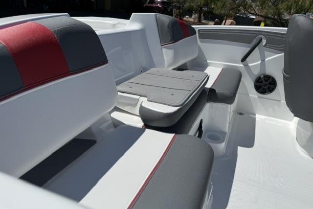 Interior of 2026 Tahoe T21 boat with gray and red seating.