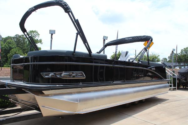 2025 Tahoe Pontoon Cascade Quad Lounger, sleek black design, docked outdoors.