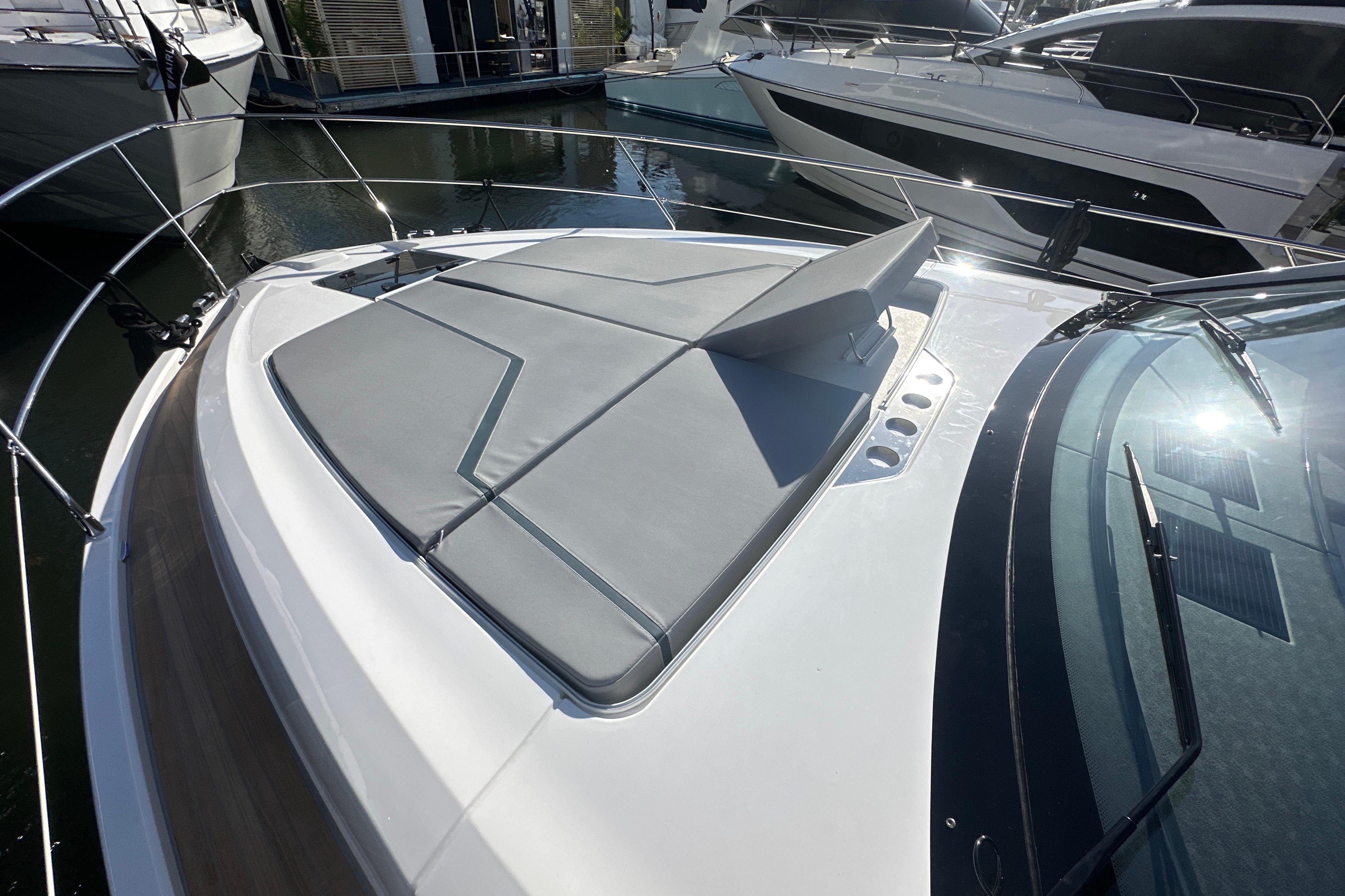 2026 Fairline Targa 47 GT yacht with sleek deck design and sunbathing area.