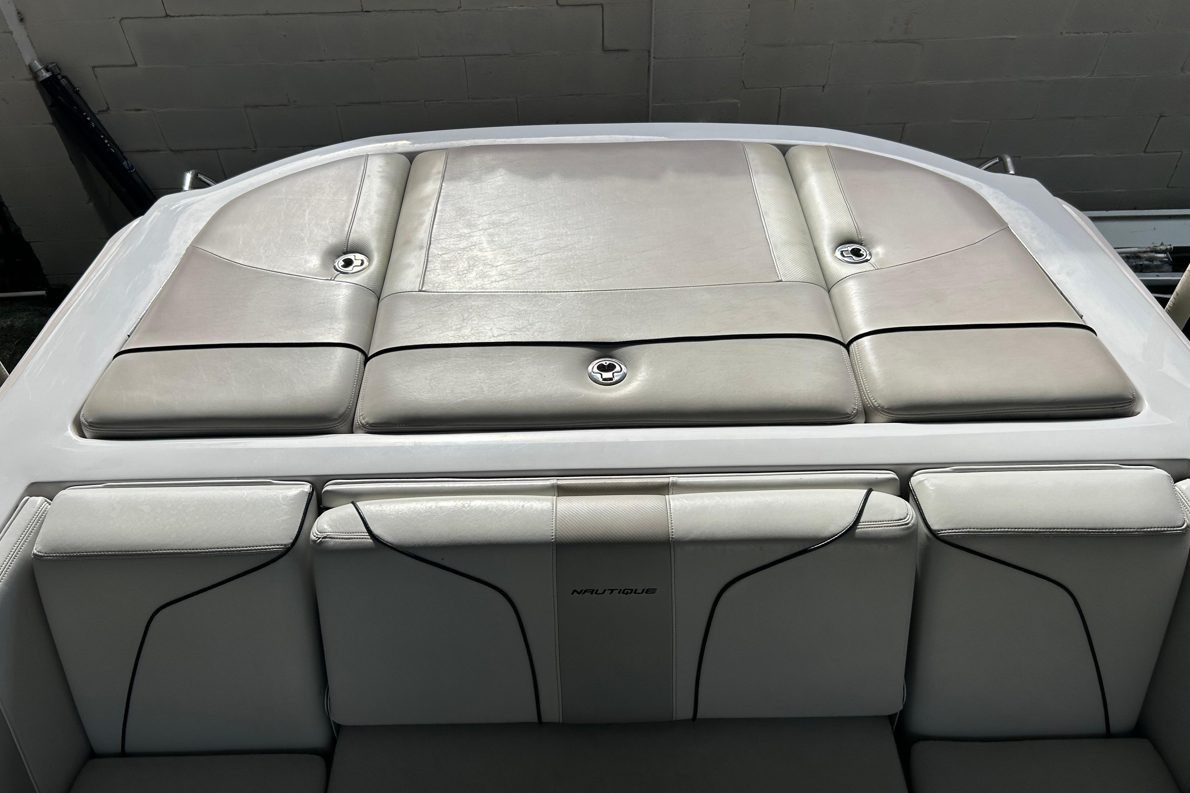 2010 Nautique Super Air Nautique 210 Coastal Edition boat seating area.