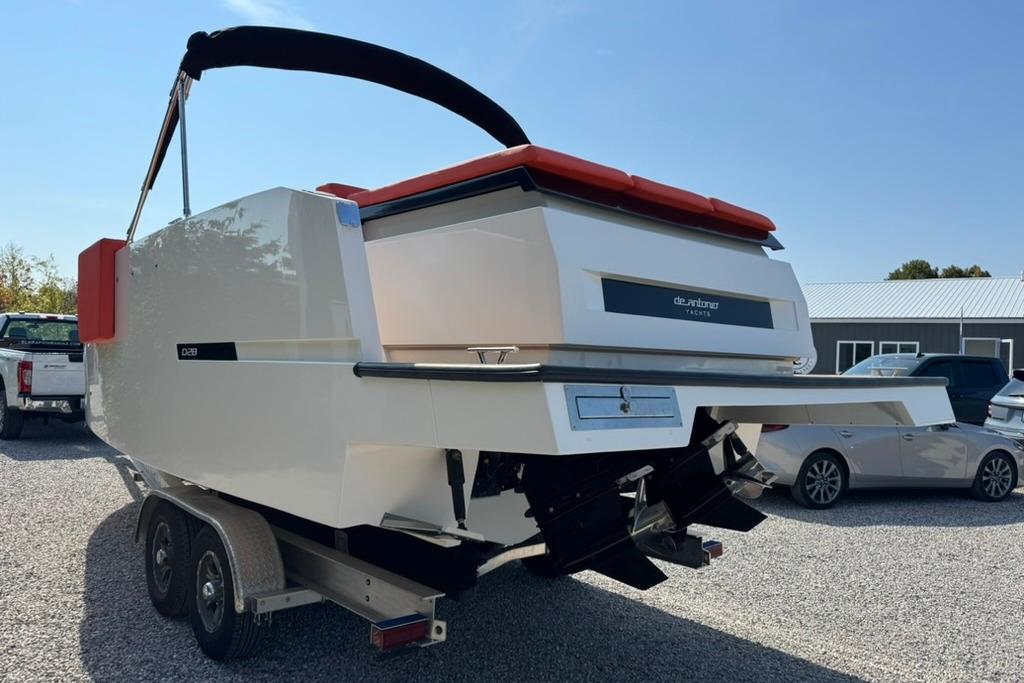 2020 De Antonio Yachts D28 on trailer, rear view, outdoor setting.