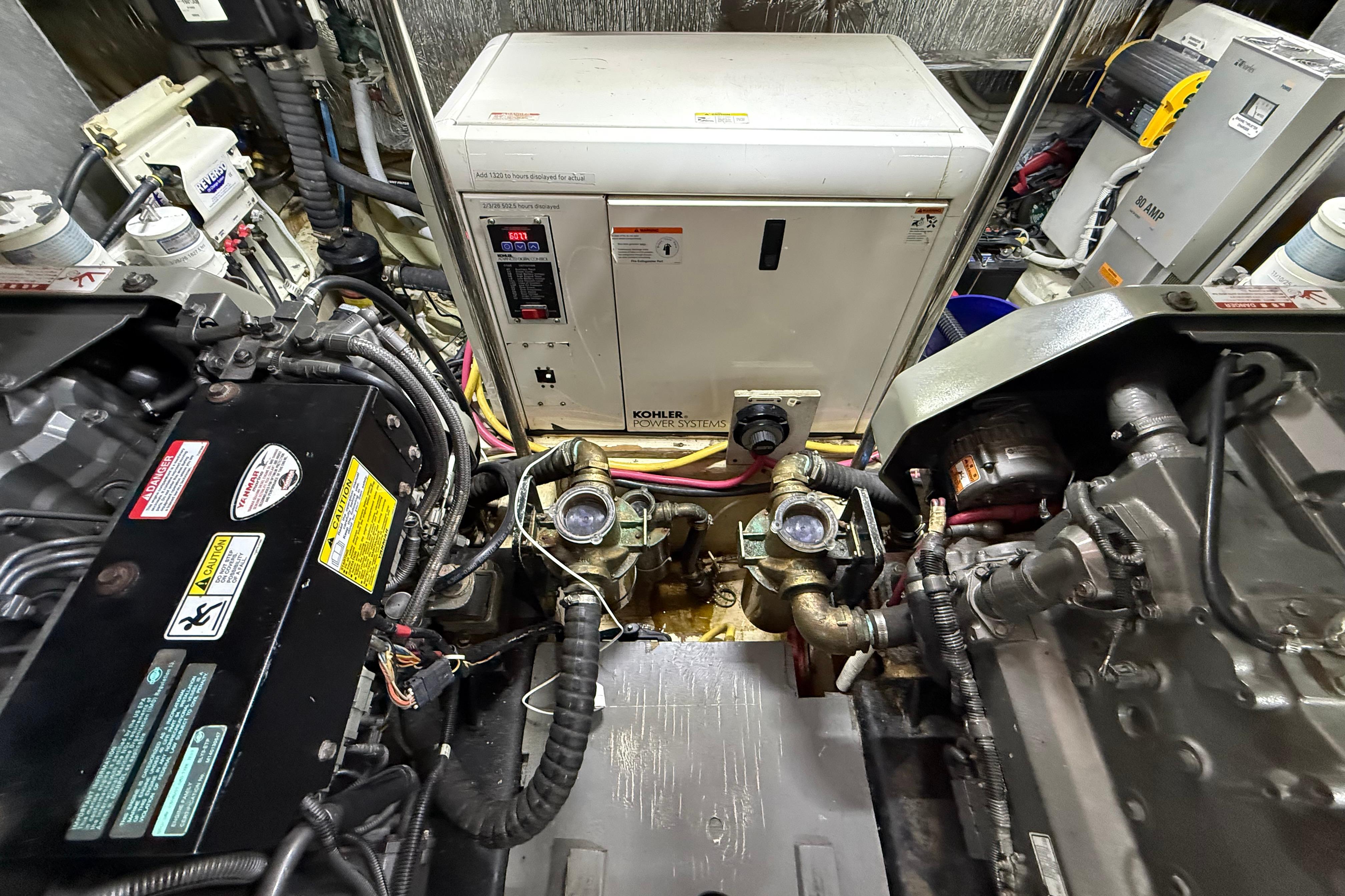 Engine room of a 2006 Carver 43 Motor Yacht with Kohler power systems.