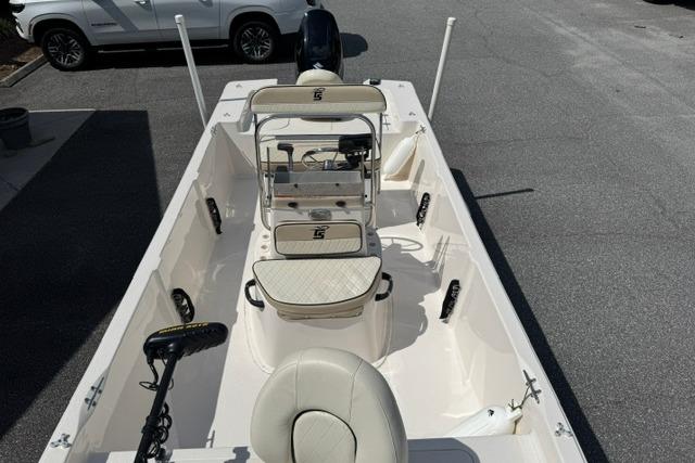2023 Carolina Skiff 192 JLS boat interior with seating and steering console.