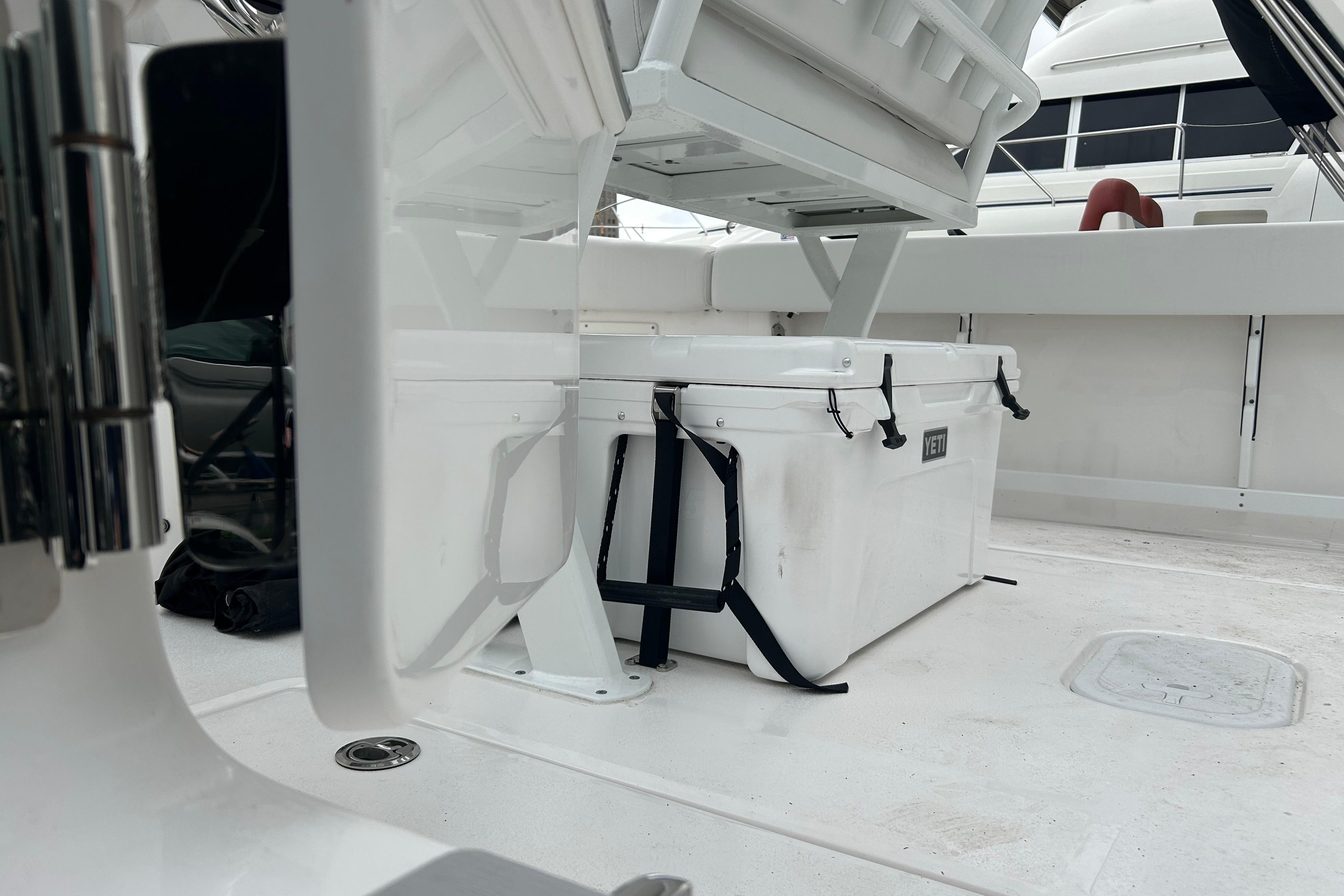 2026 Sea Fox 268 Commander boat deck with Yeti cooler and seating area.