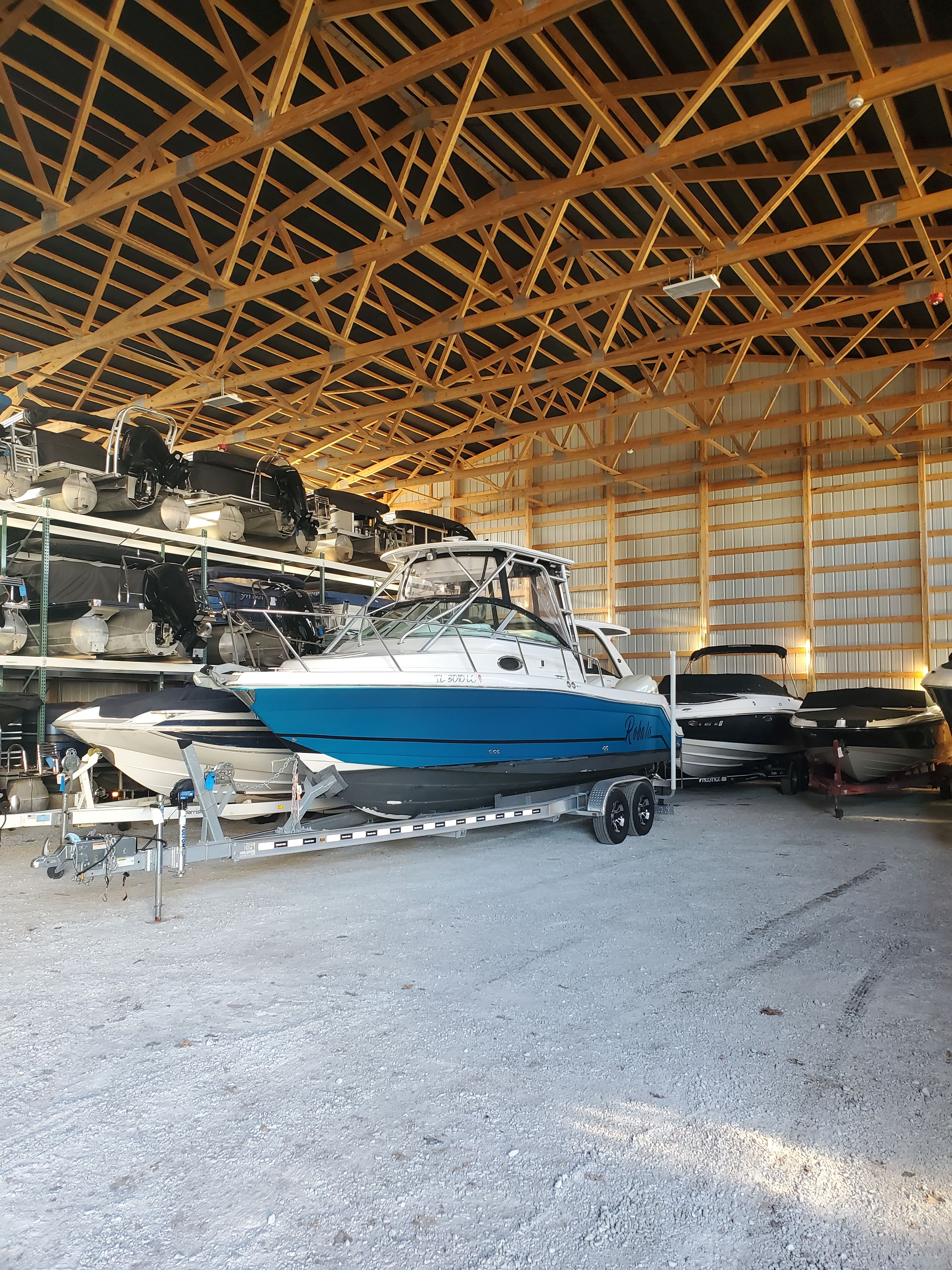 2005 Robalo R265 Walkaround boat in storage facility.