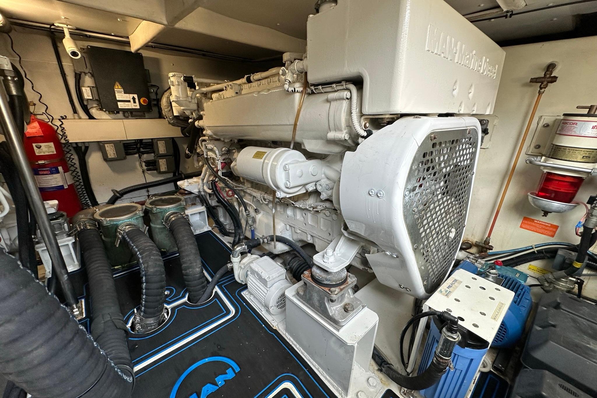 Engine room of 2013 Azimut Fly 53 yacht, featuring a MAN diesel engine.