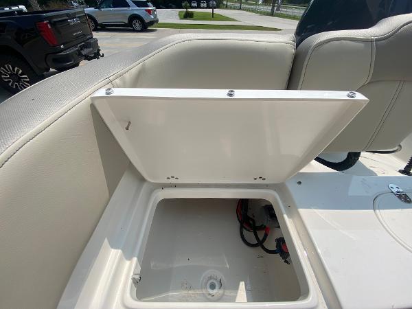 2024 Key West 203 FS boat storage compartment with open lid.