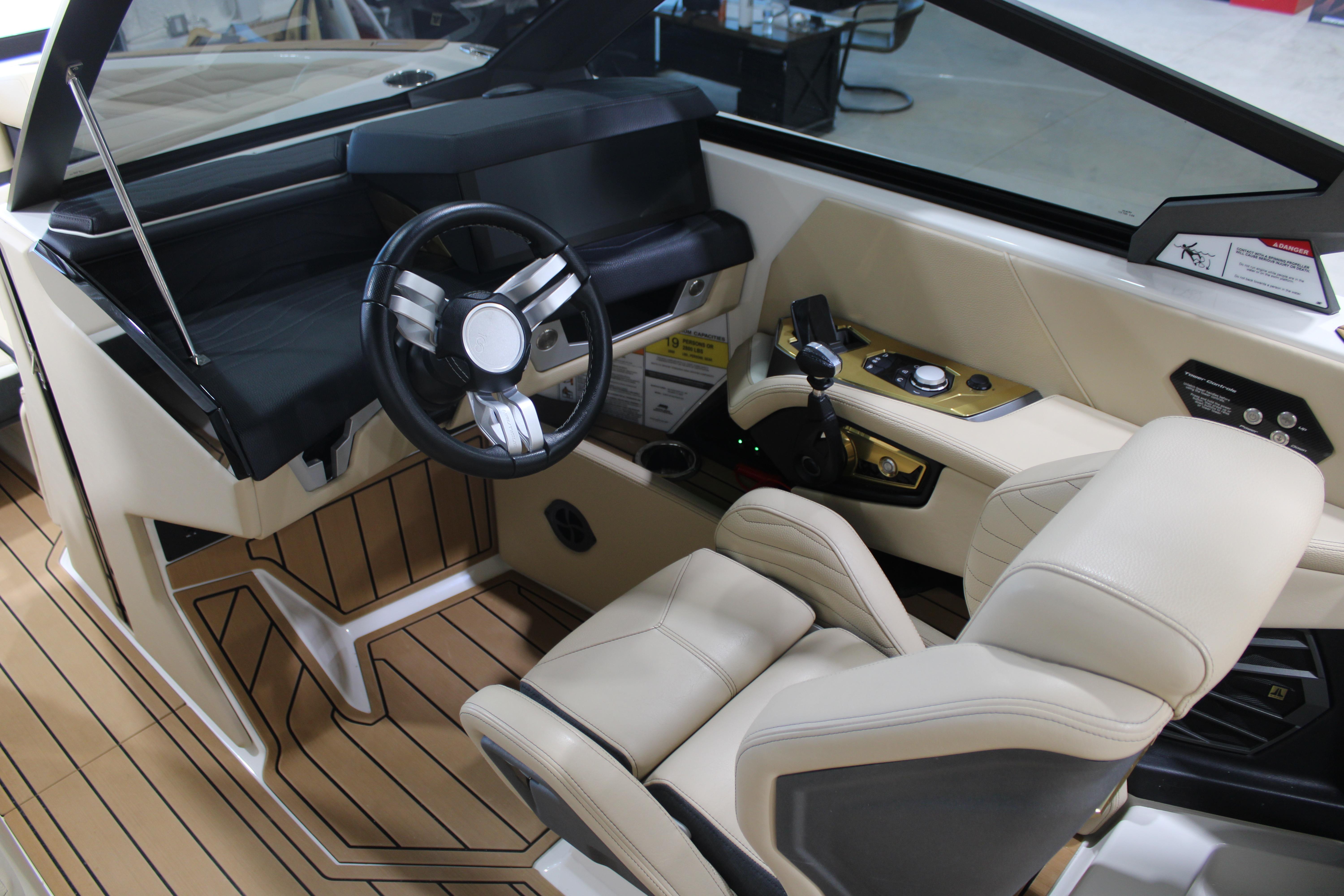 2025 Nautique Super Air Nautique G25 cockpit with modern steering and controls.
