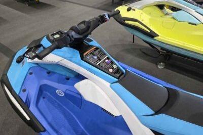 2026 Yamaha WaveRunner JetBlaster DLX 3-Up in blue, showcasing sleek design and controls.
