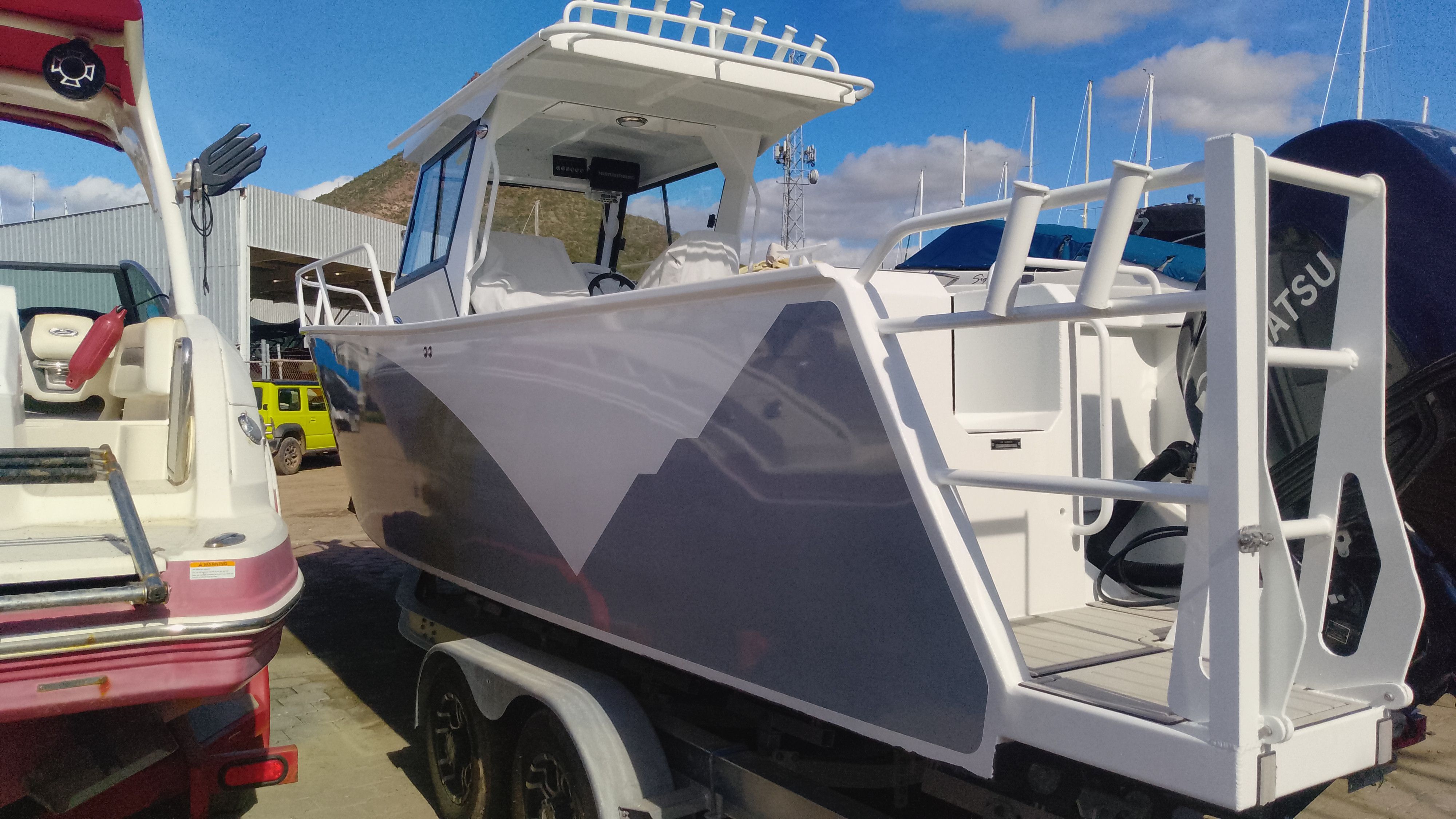 Gospel Boat 7.5M 2024 parked outdoors on a trailer.