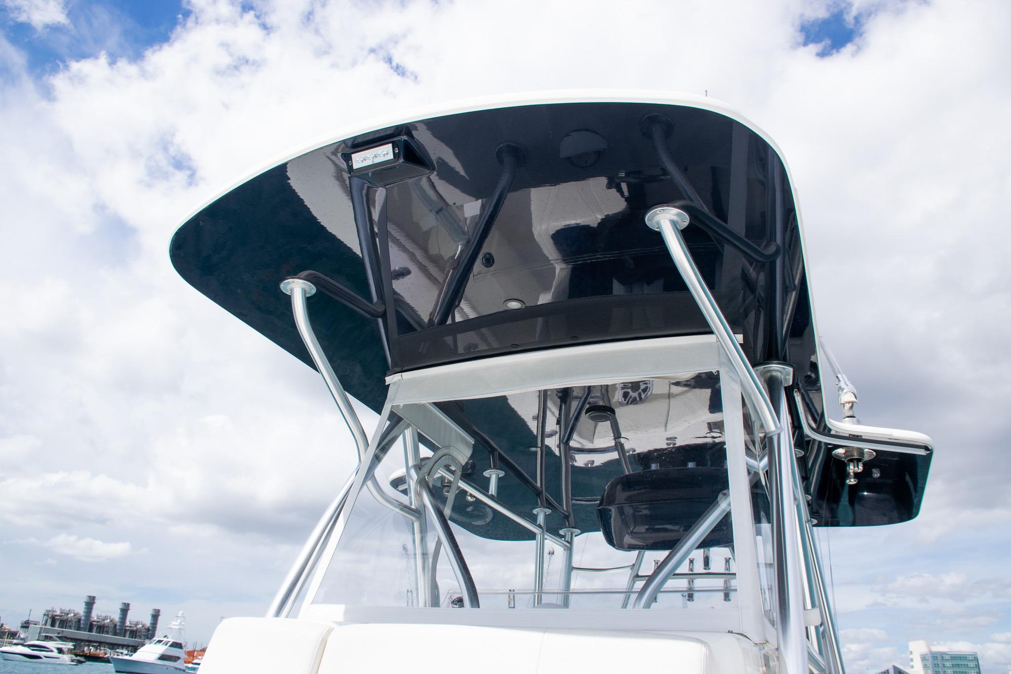 2022 SeaVee 390Z boat with sleek T-top against cloudy sky.