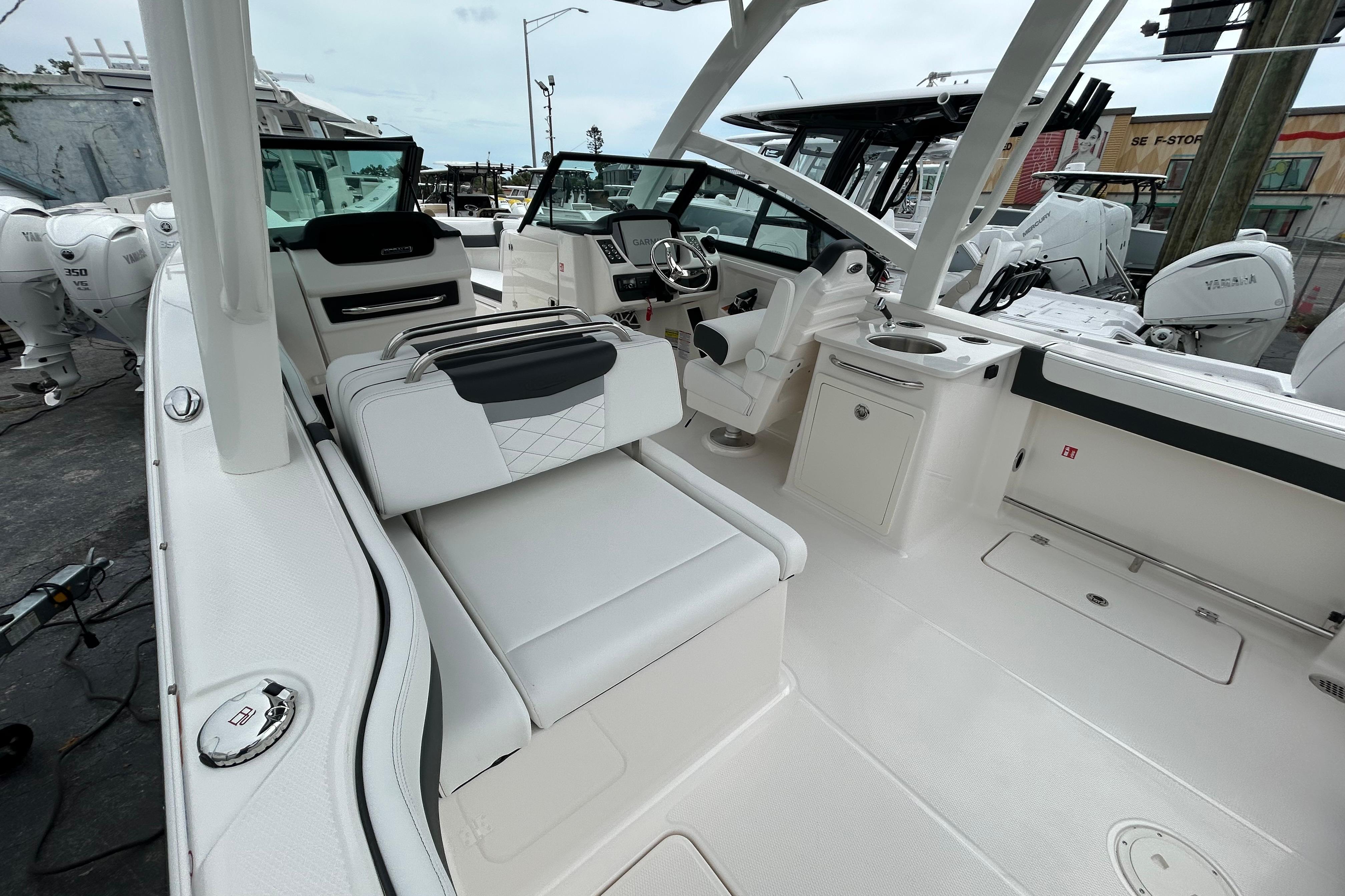 2026 Robalo R257 Dual Console boat interior with seating and helm station.