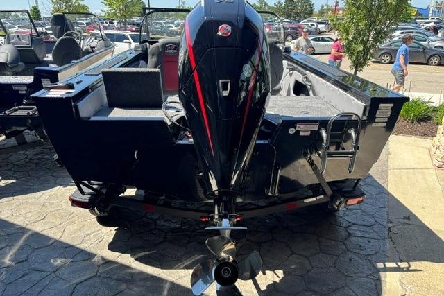 2026 Ranger VX1888 WT boat with powerful outboard motor, parked outdoors.