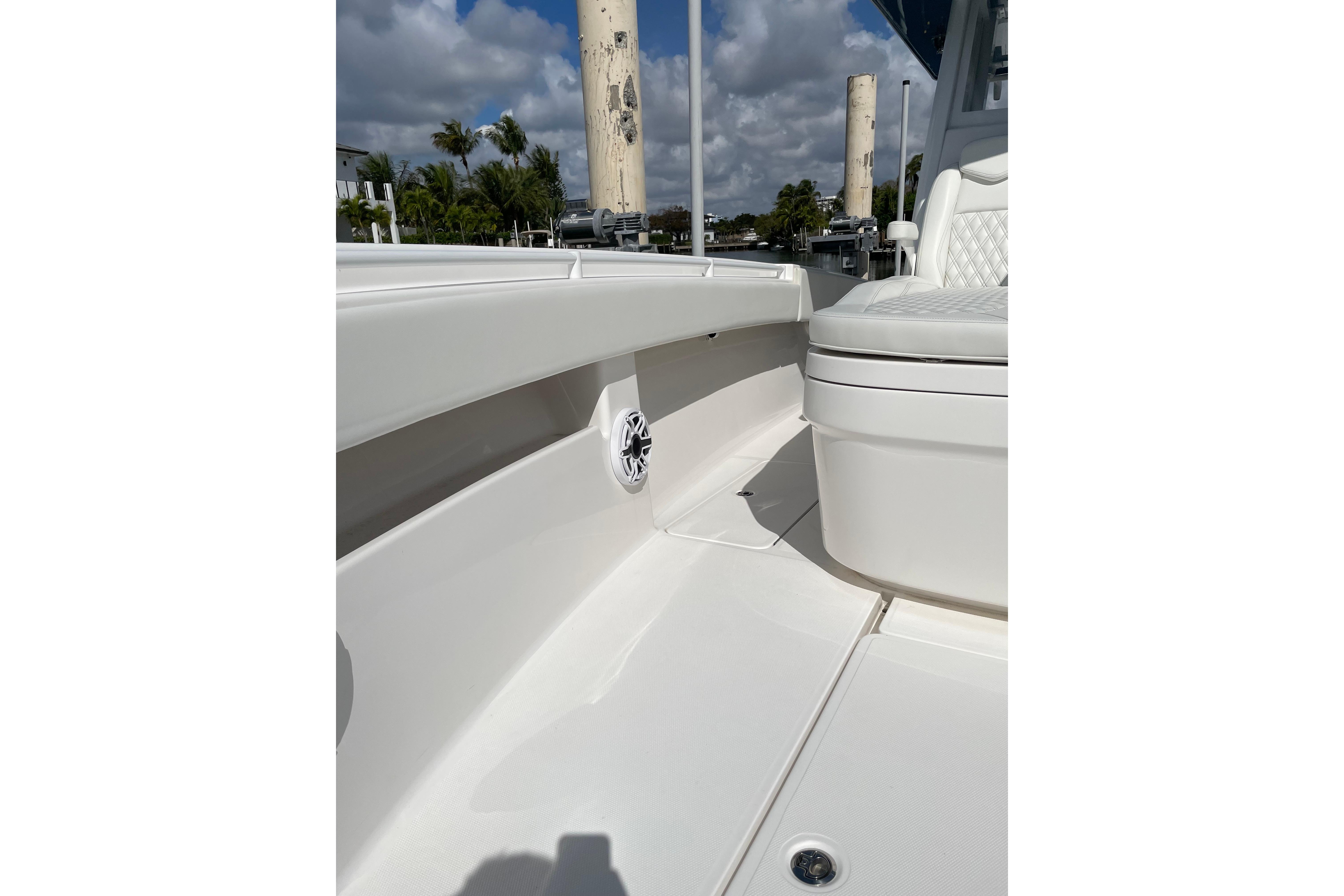 2024 Invincible 36 Open Fisherman boat interior with seating and speaker detail.