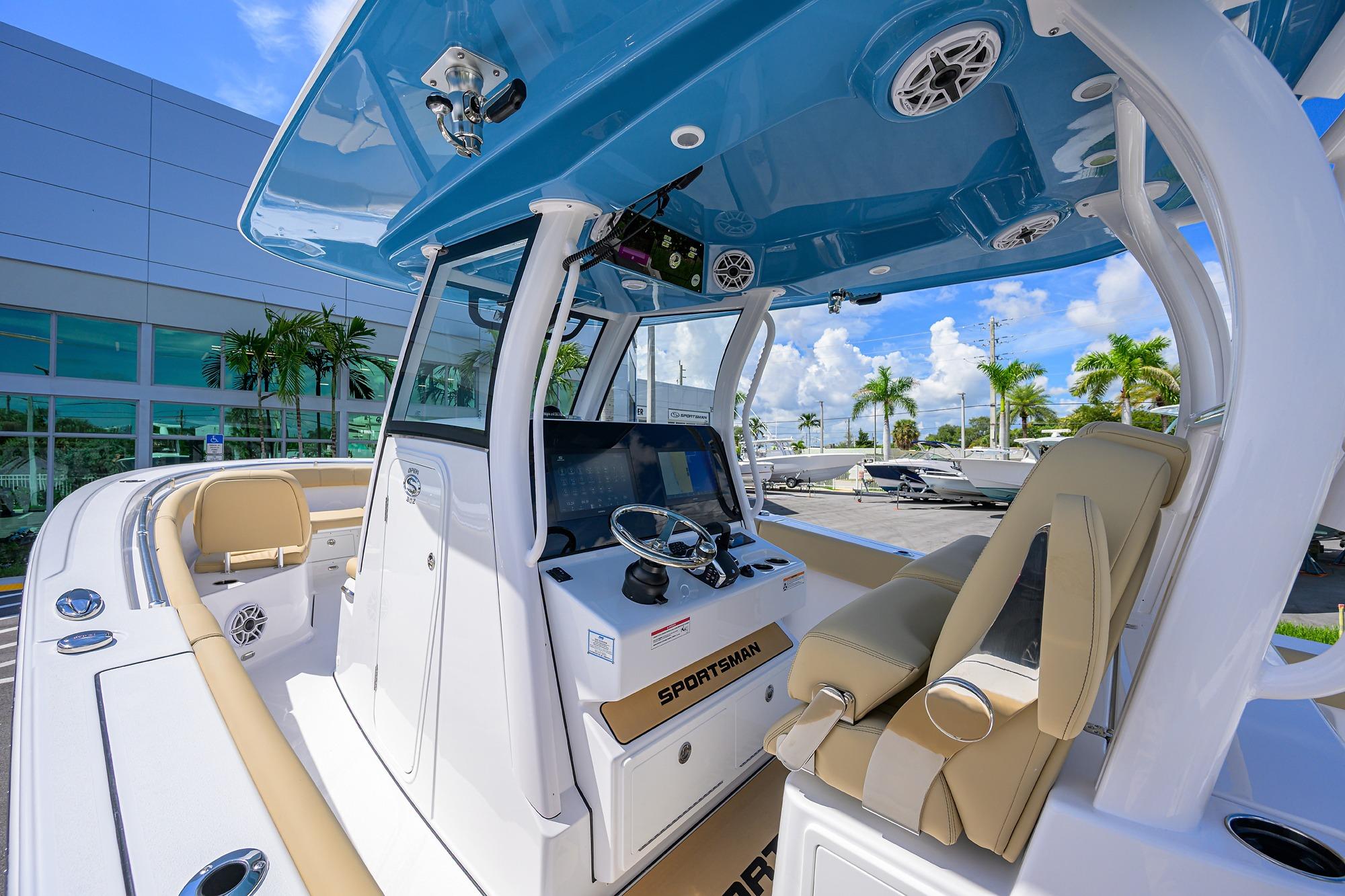 2026 Sportsman Open 302 Center Console boat interior with modern helm and seating.
