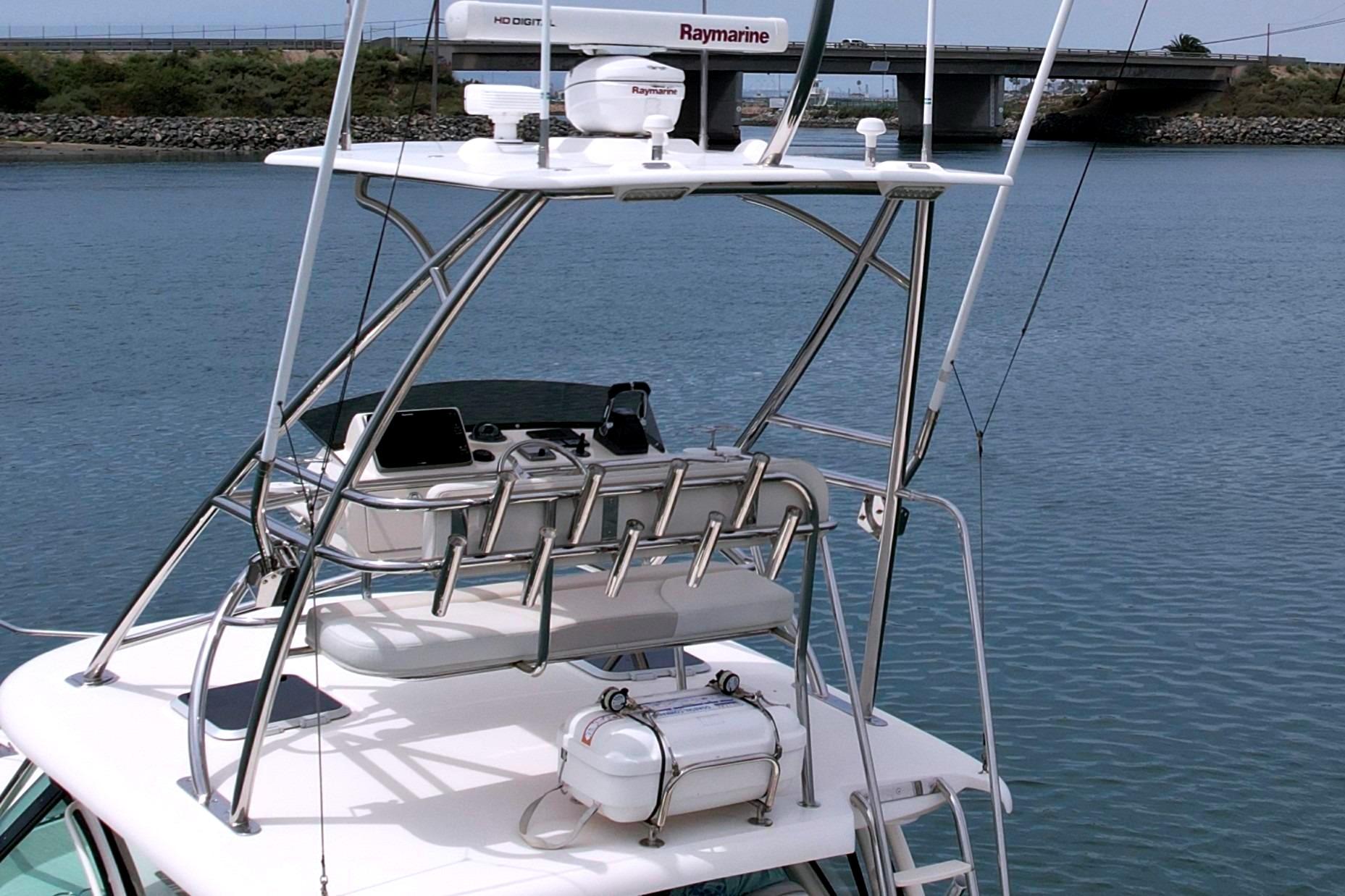 2012 Pursuit OS 345 Offshore boat with radar and fishing rod holders.