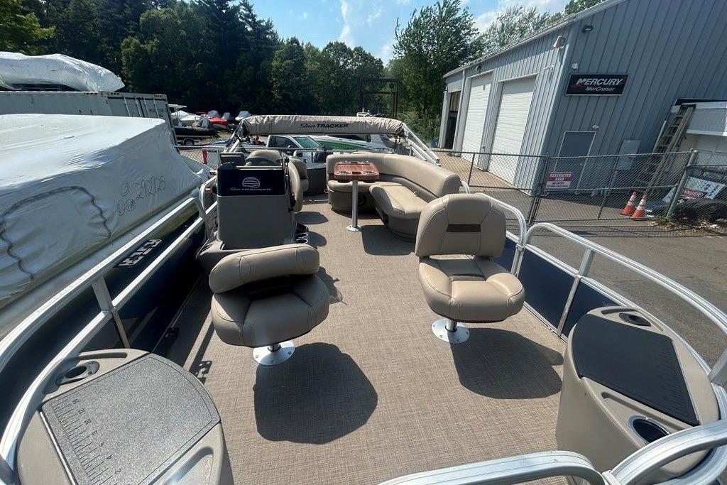 2023 Sun Tracker Bass Buggy 18 DLX pontoon boat with spacious seating and modern design.