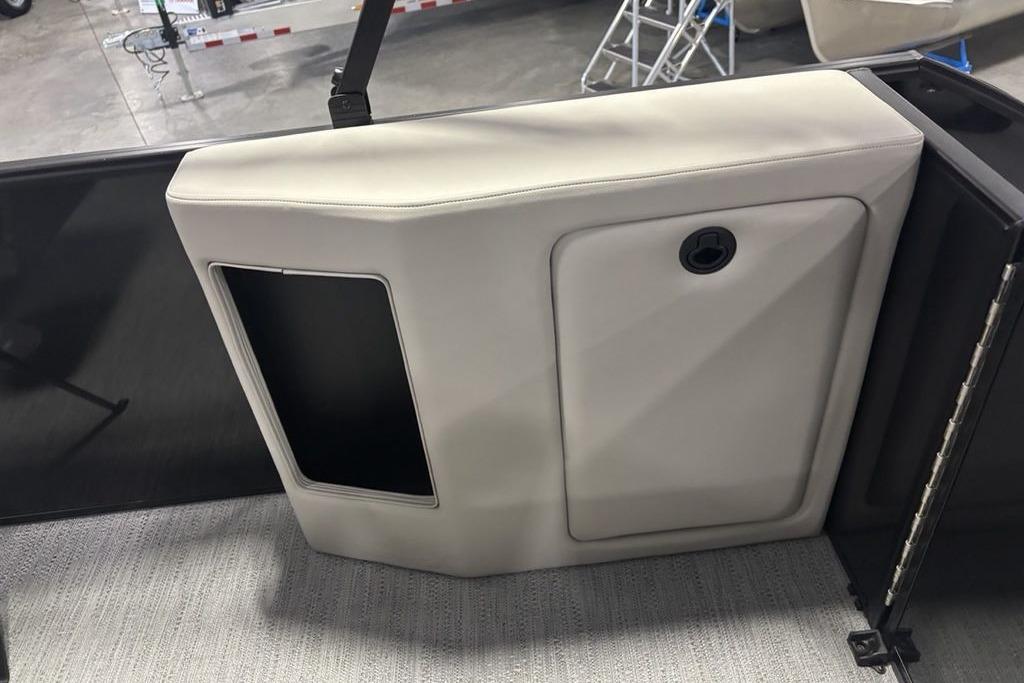 Interior detail of 2026 Godfrey Xperience 2086 SFLX, featuring sleek storage compartment design.