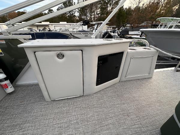 2025 Tahoe Pontoon LTZ Cruise Rear Bench with storage compartments on deck.