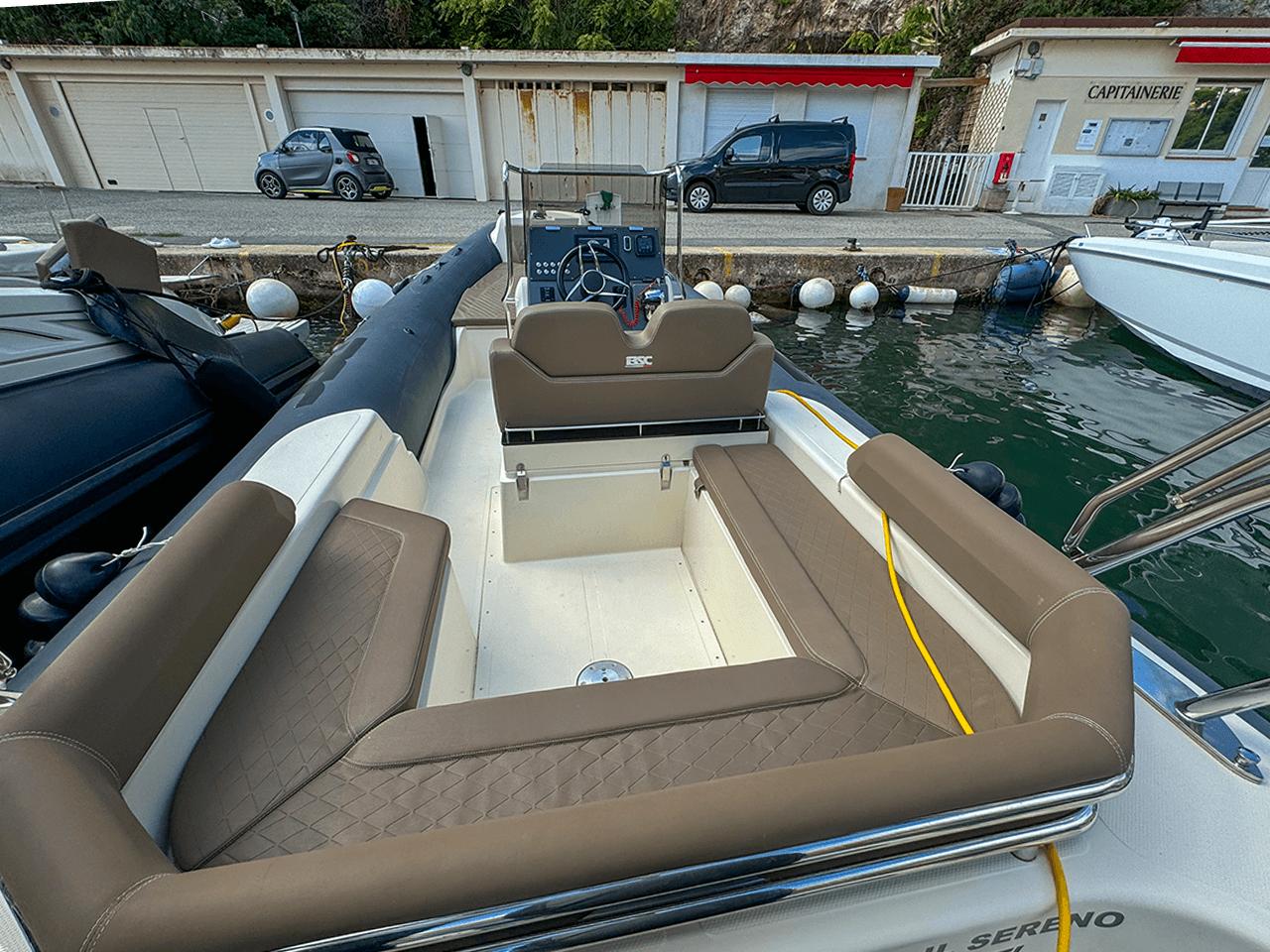 2019 BSC 78 boat with brown seating, docked at a marina.
