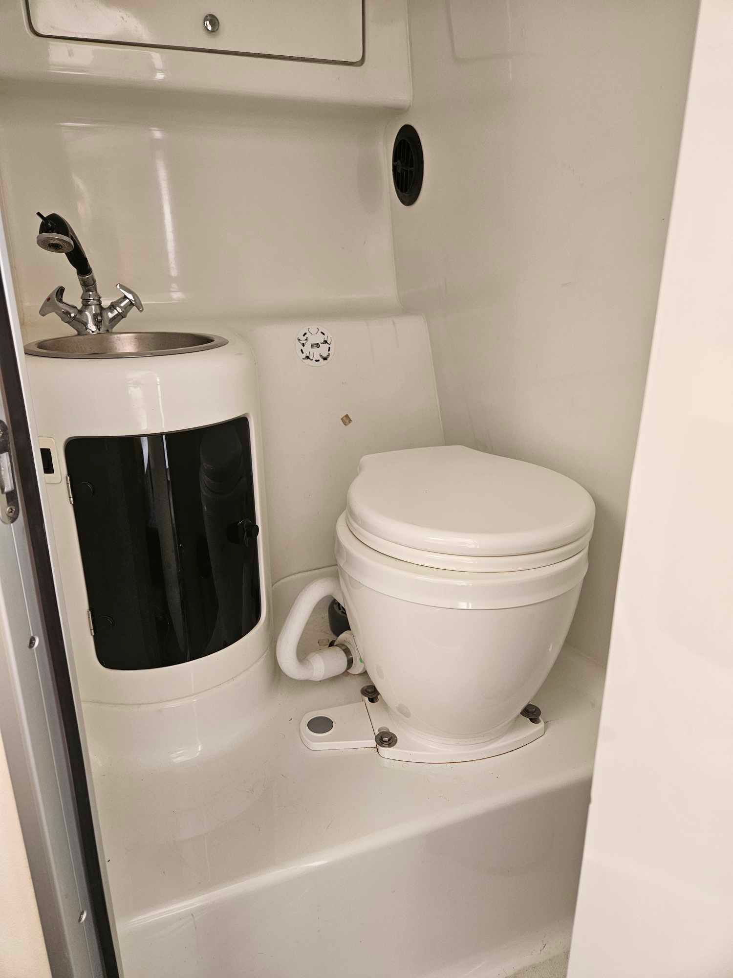 Interior of a 1997 Baja 38 Special Boss with toilet and sink.