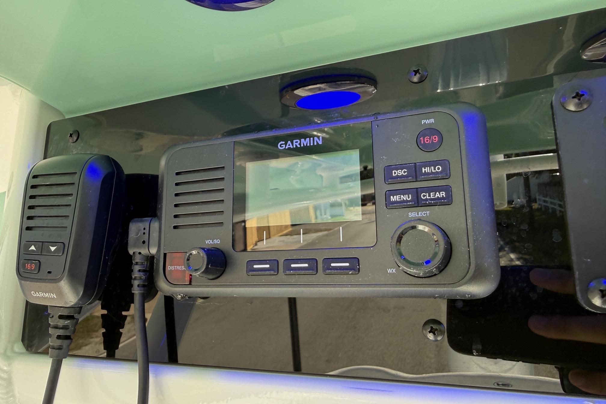 Garmin marine radio on 2026 Sea Hunt Ultra 255 SE boat dashboard.