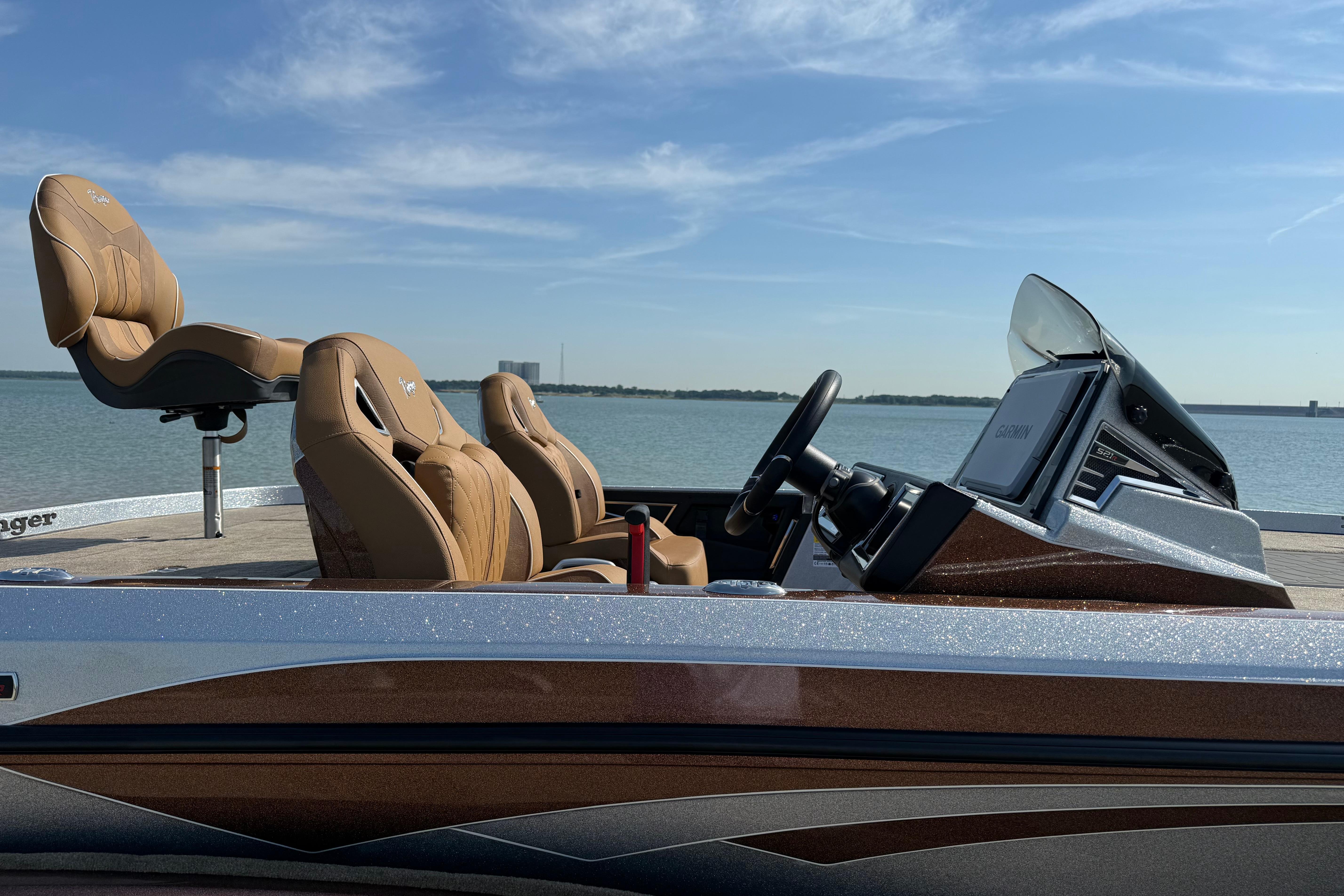 2026 Ranger Z521R boat with tan seats and Garmin navigation on a sunny lake.