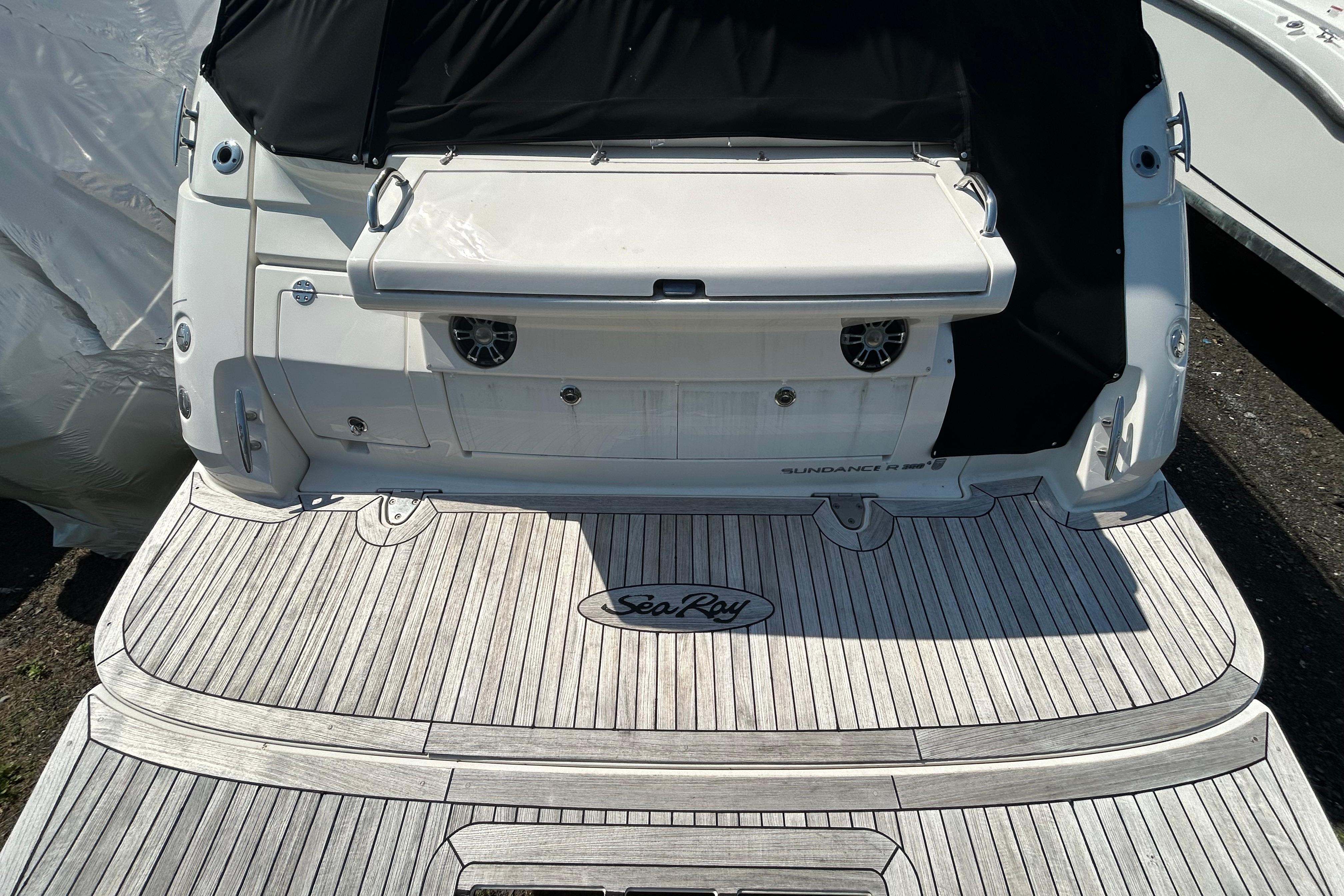2019 Sea Ray Sundancer 350 yacht with spacious deck and sleek design.