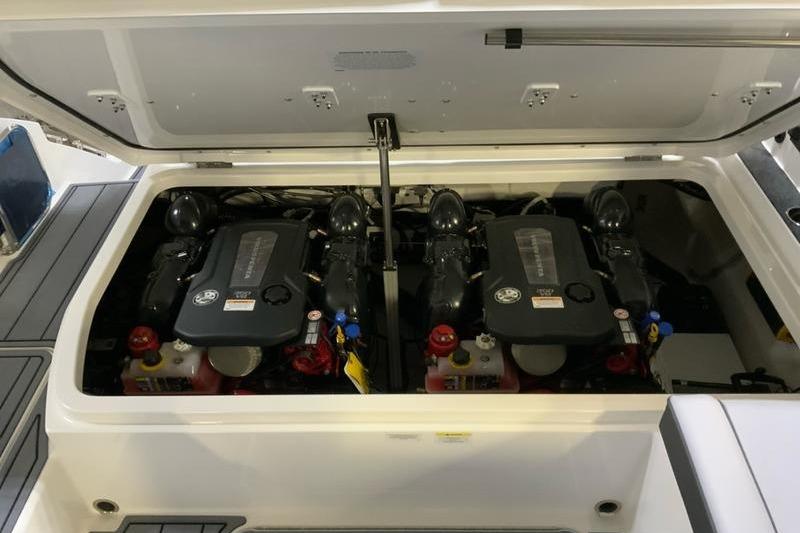 Engine compartment of 2026 Cobalt R31 boat, showcasing dual engines and components.