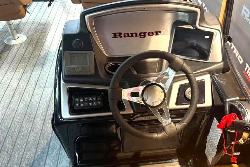 Steering console of 2026 Ranger 220F boat with modern controls and dashboard.