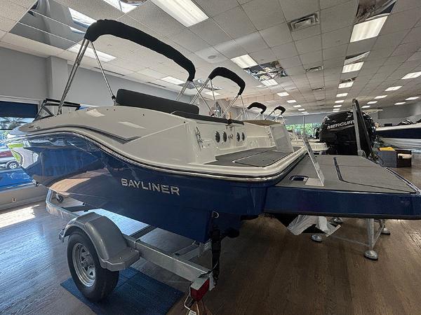 2024 Bayliner DX 2050 boat on display in showroom.