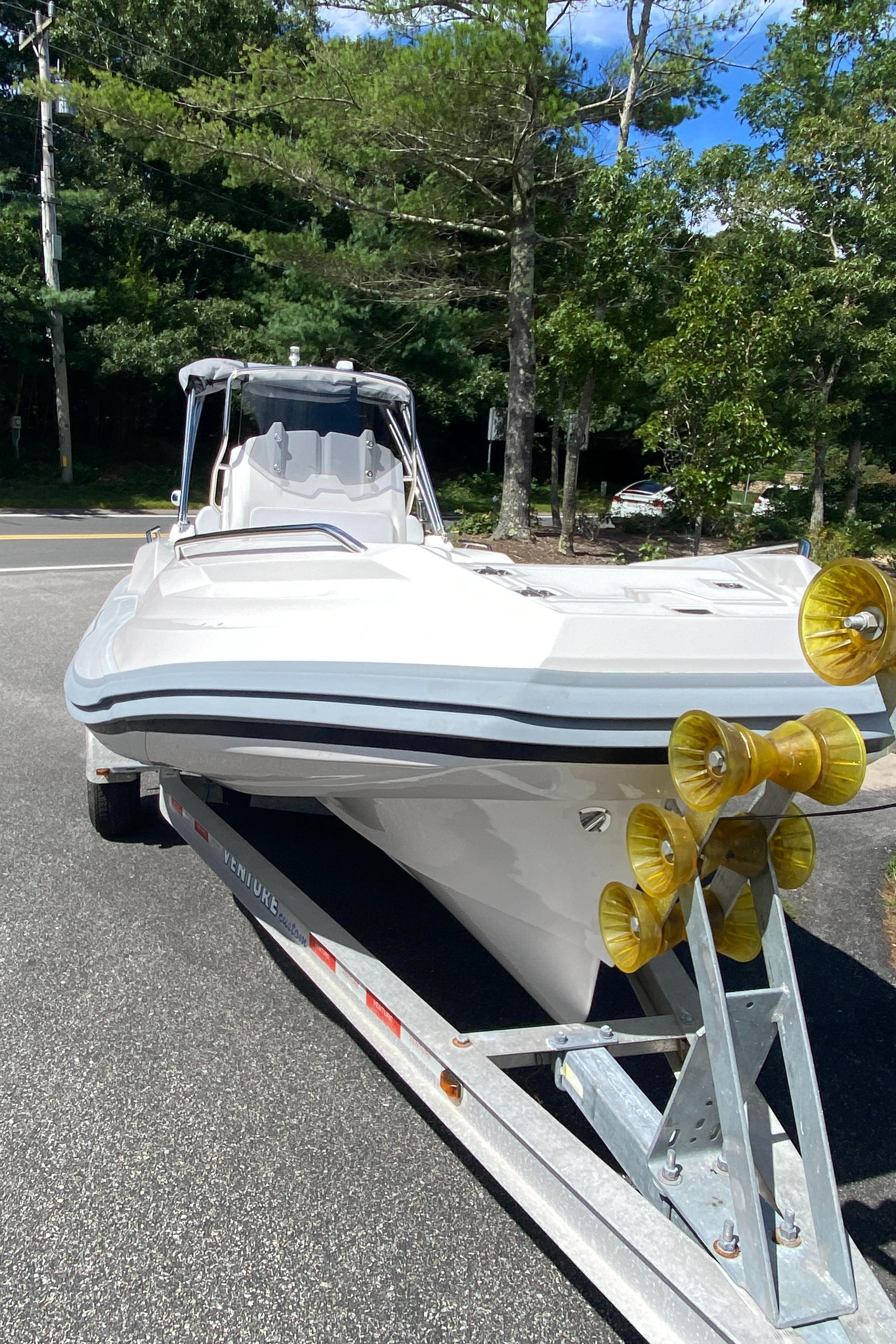 2024 Zar Formenti 49 SL boat on trailer in outdoor setting.